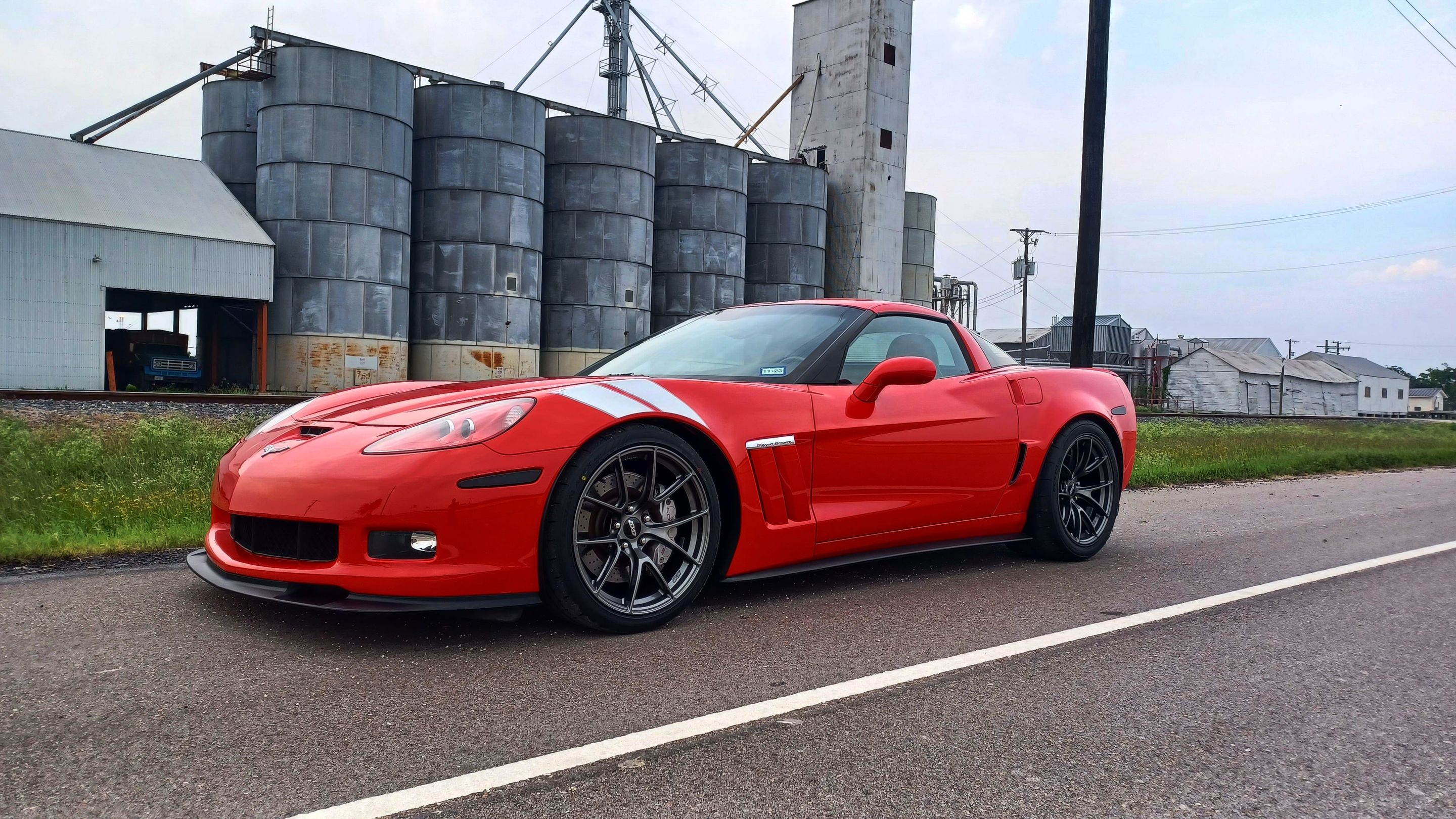 Red Chevrolet C6 Corvette Grand Sport with 19" VS-5RS Apex wheels in Anthracite