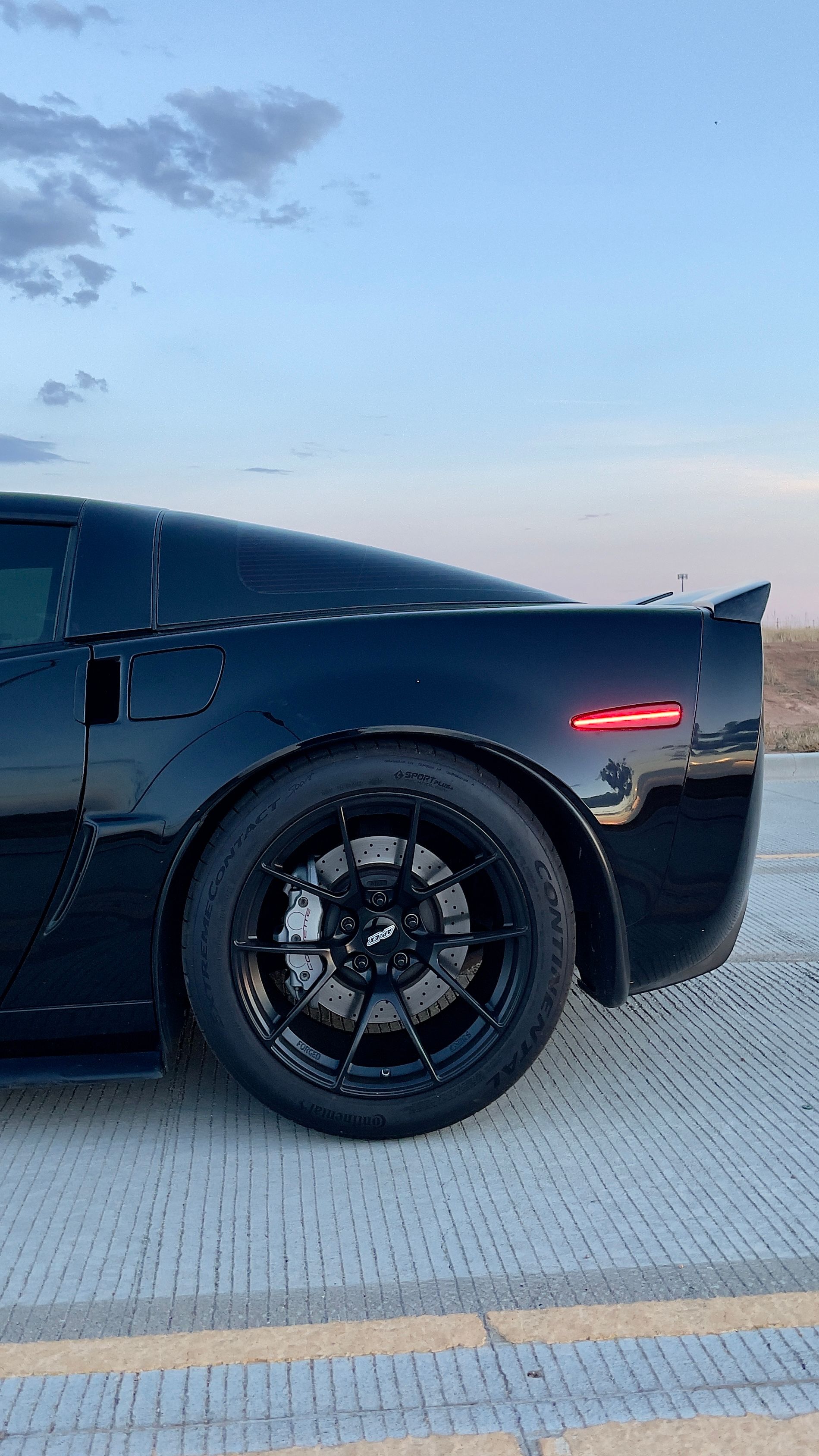 Black Chevrolet C6 Corvette Grand Sport with 18"/19" VS-5RS Apex wheels in Satin Black