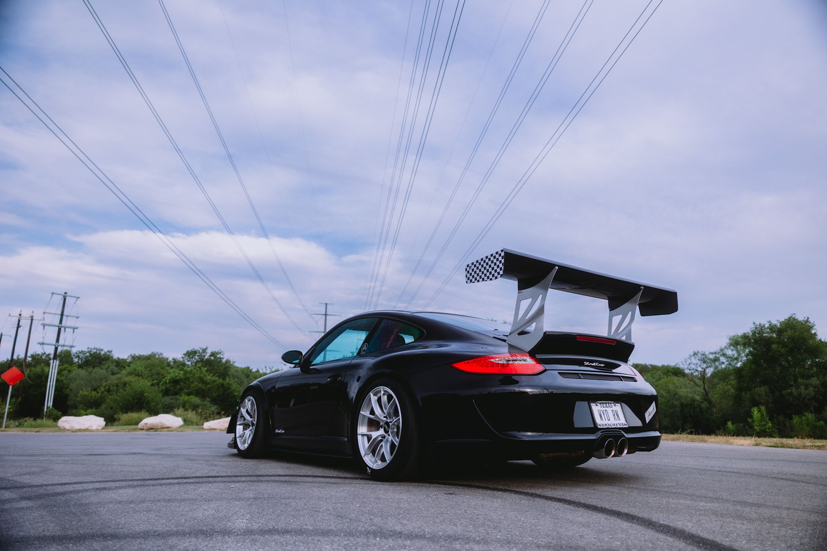 Black Porsche 911 997 Carrera S with 18" VS-5RS Apex wheels in Brushed Clear
