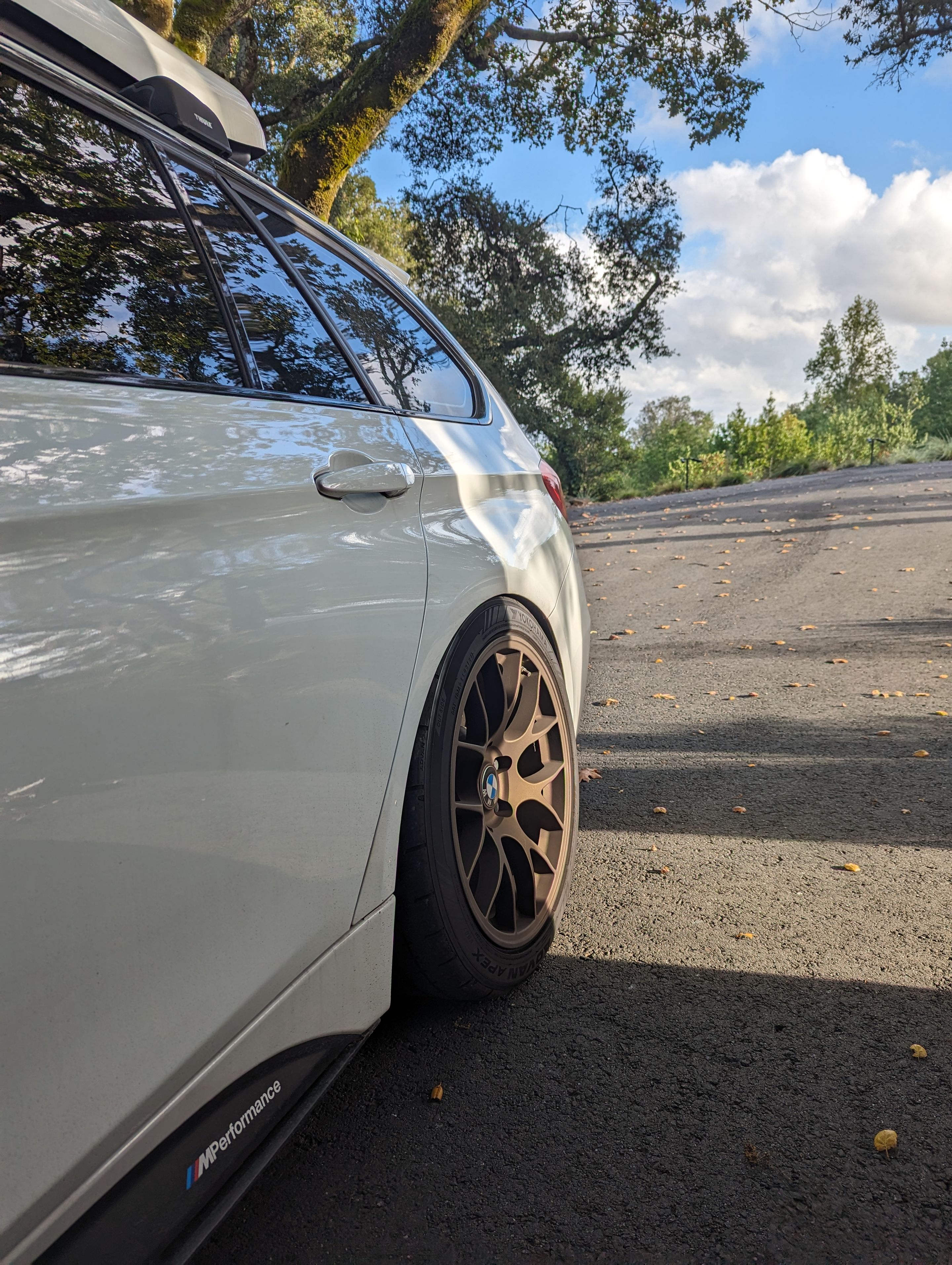 White BMW F31 Wagon 3 Series with 18" EC-7 Apex wheels in Satin Bronze