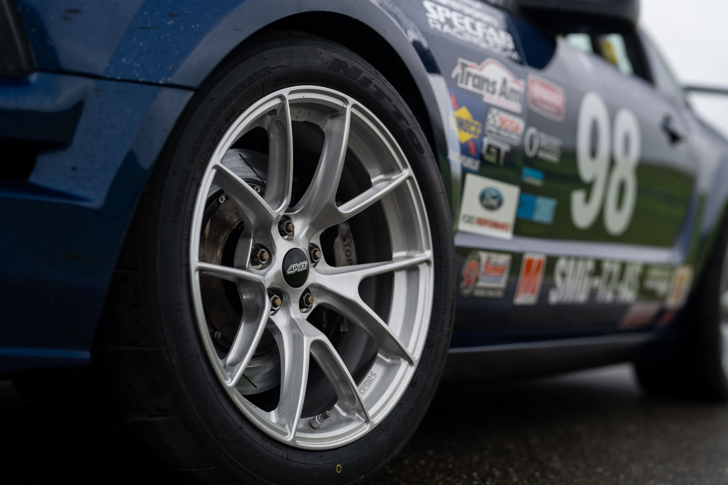 Blue Ford S197 Mustang GT with 18" VS-5RS Apex wheels in Brushed Clear