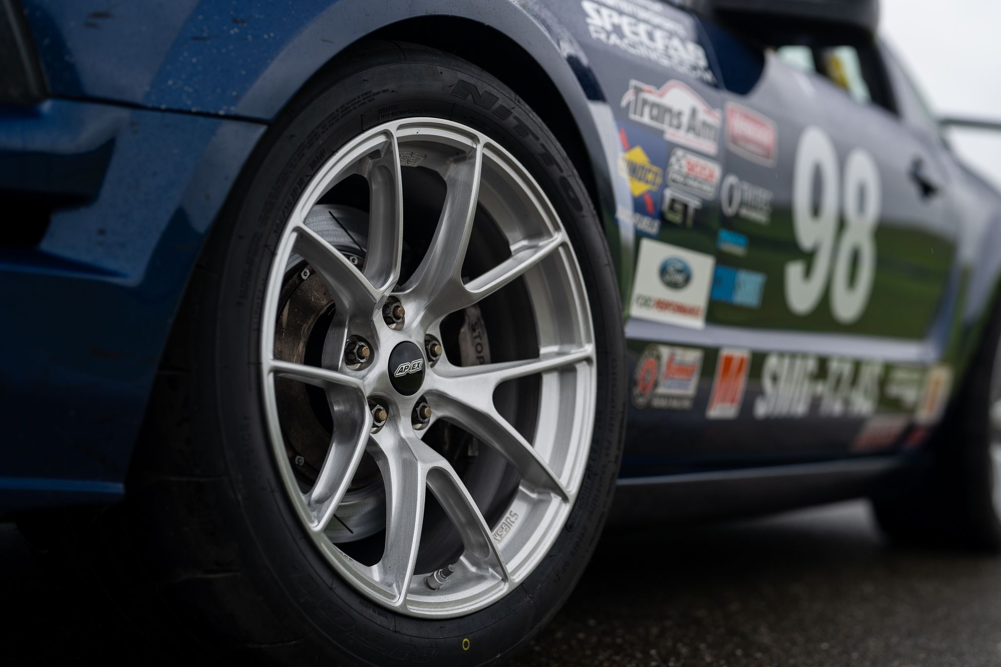Blue Ford S197 Mustang GT with 18" VS-5RS Apex wheels in Brushed Clear
