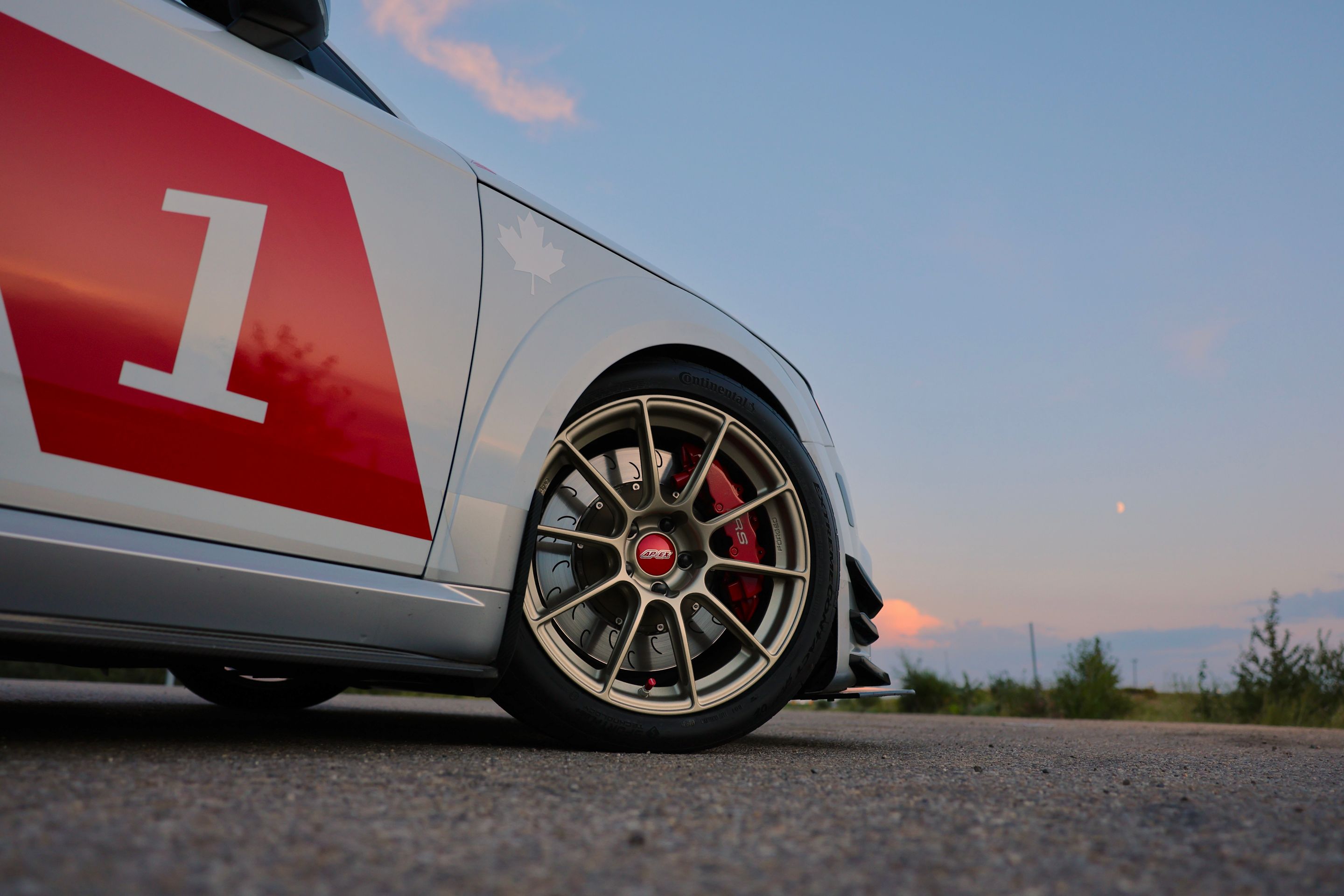 White Audi FV/8S TT RS with 18" SM-10RS Apex wheels in Motorsport Gold