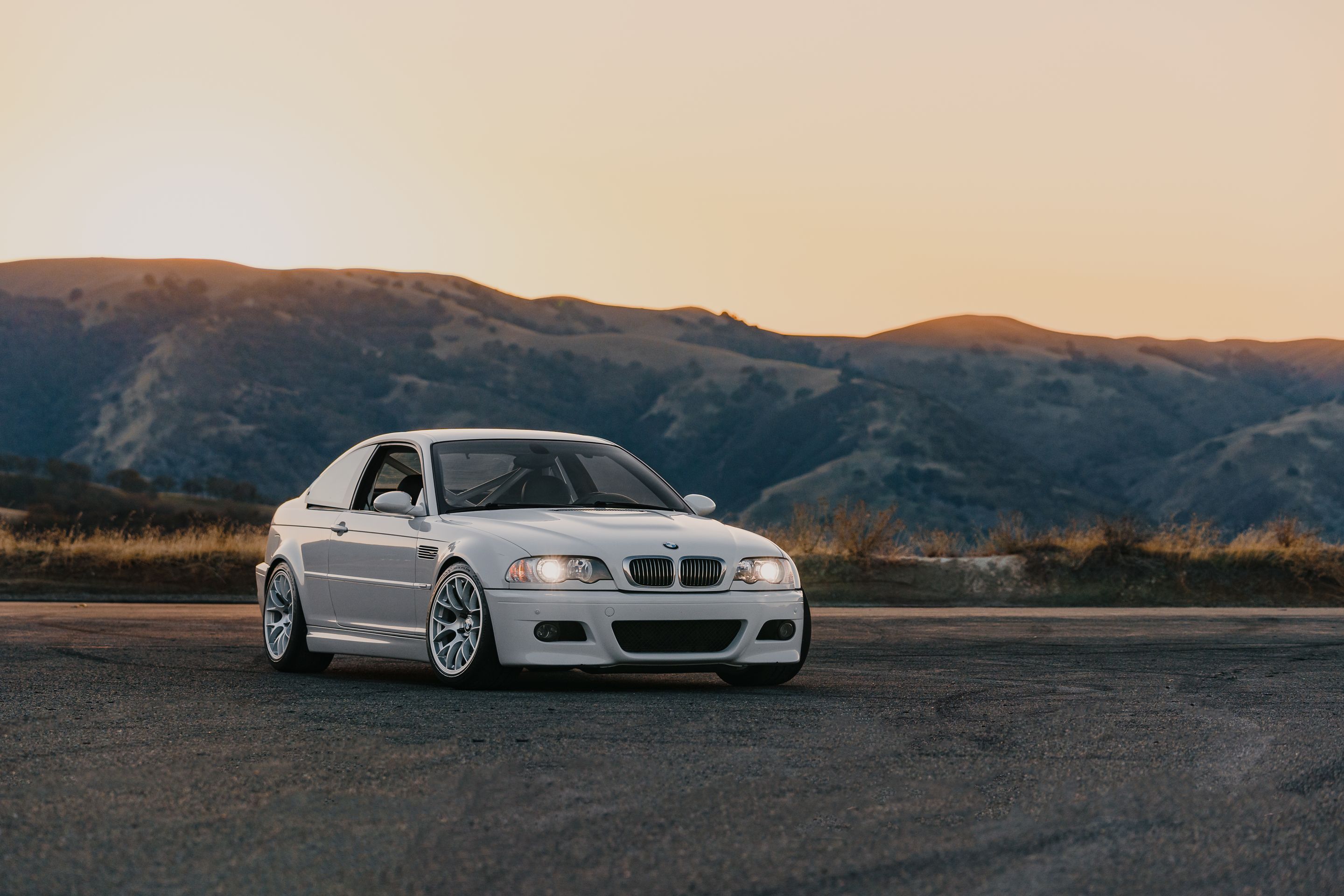 White BMW E46 M3 with 18" EC-7 Apex wheels in Race Silver