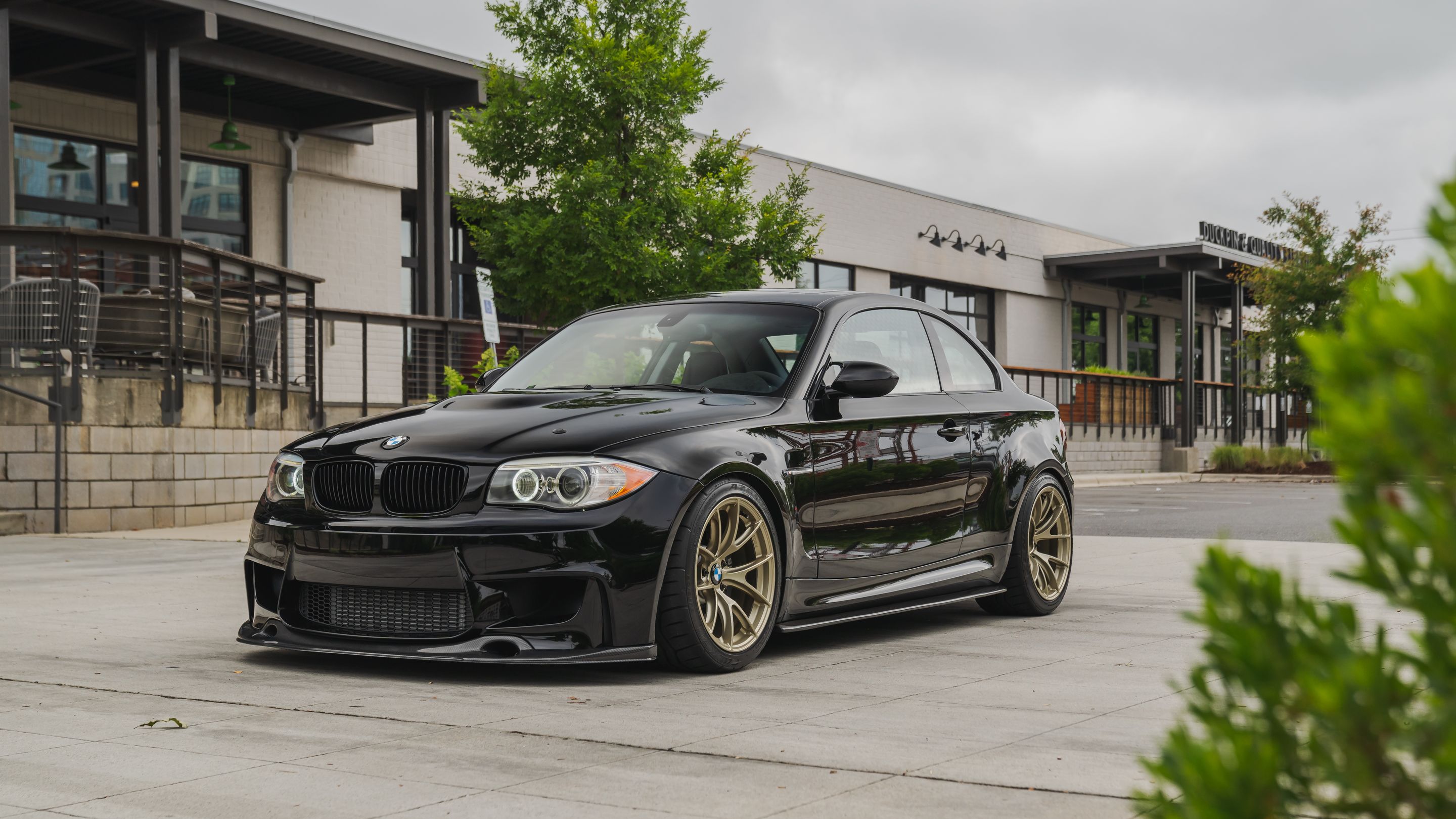 Black BMW E82 Coupe 1 Series with 18" VS-5RS Apex wheels in Motorsport Gold