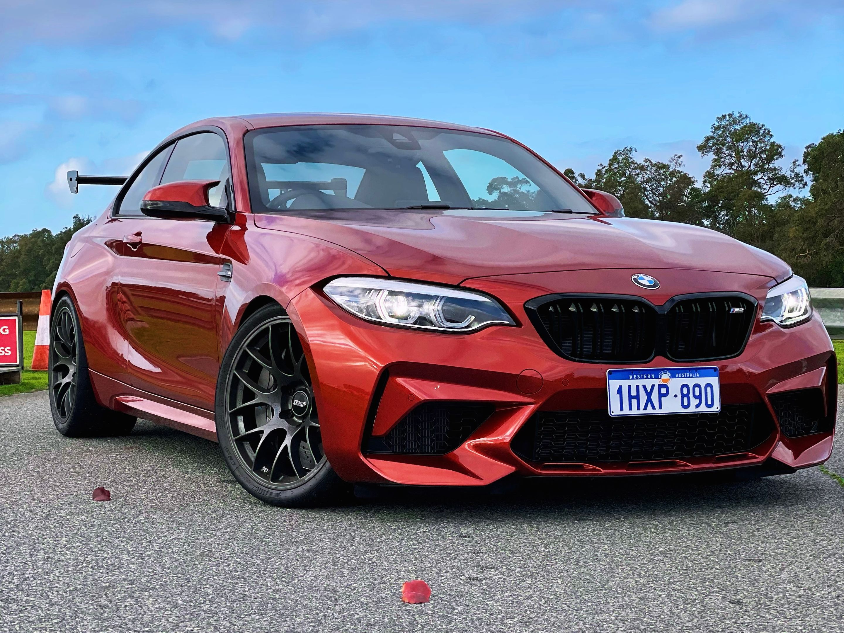 Orange BMW F87 M2 with 19" EC-7 Apex wheels in Anthracite