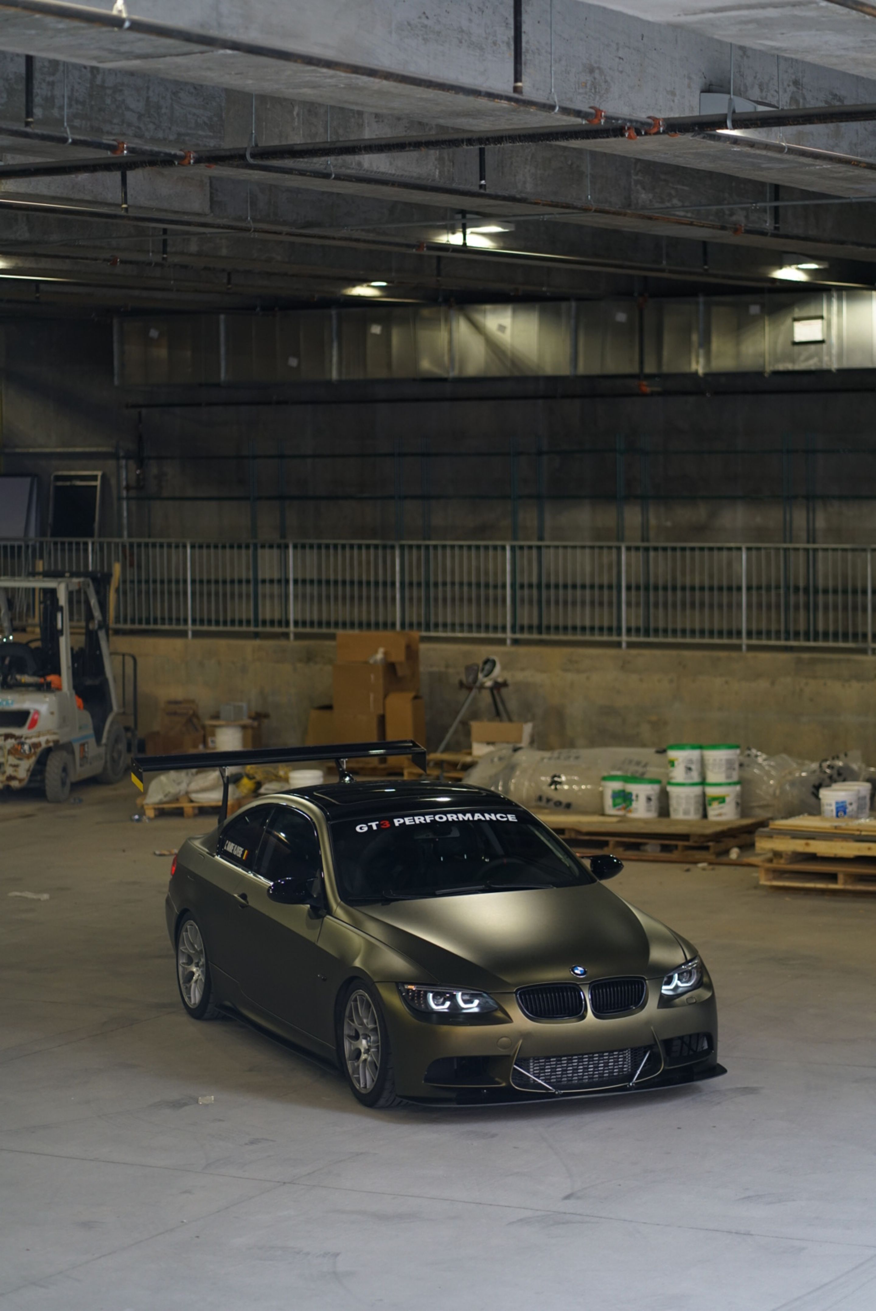 Brown BMW E92 Coupe 3 Series with 18" EC-7 Apex wheels in Race Silver