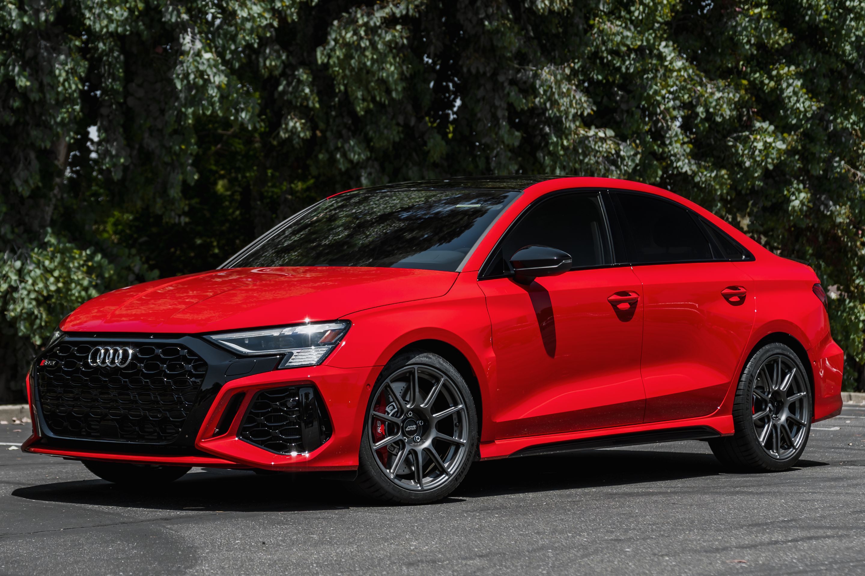 Red Audi 8Y RS 3 with 18" SM-10 Apex wheels in Anthracite