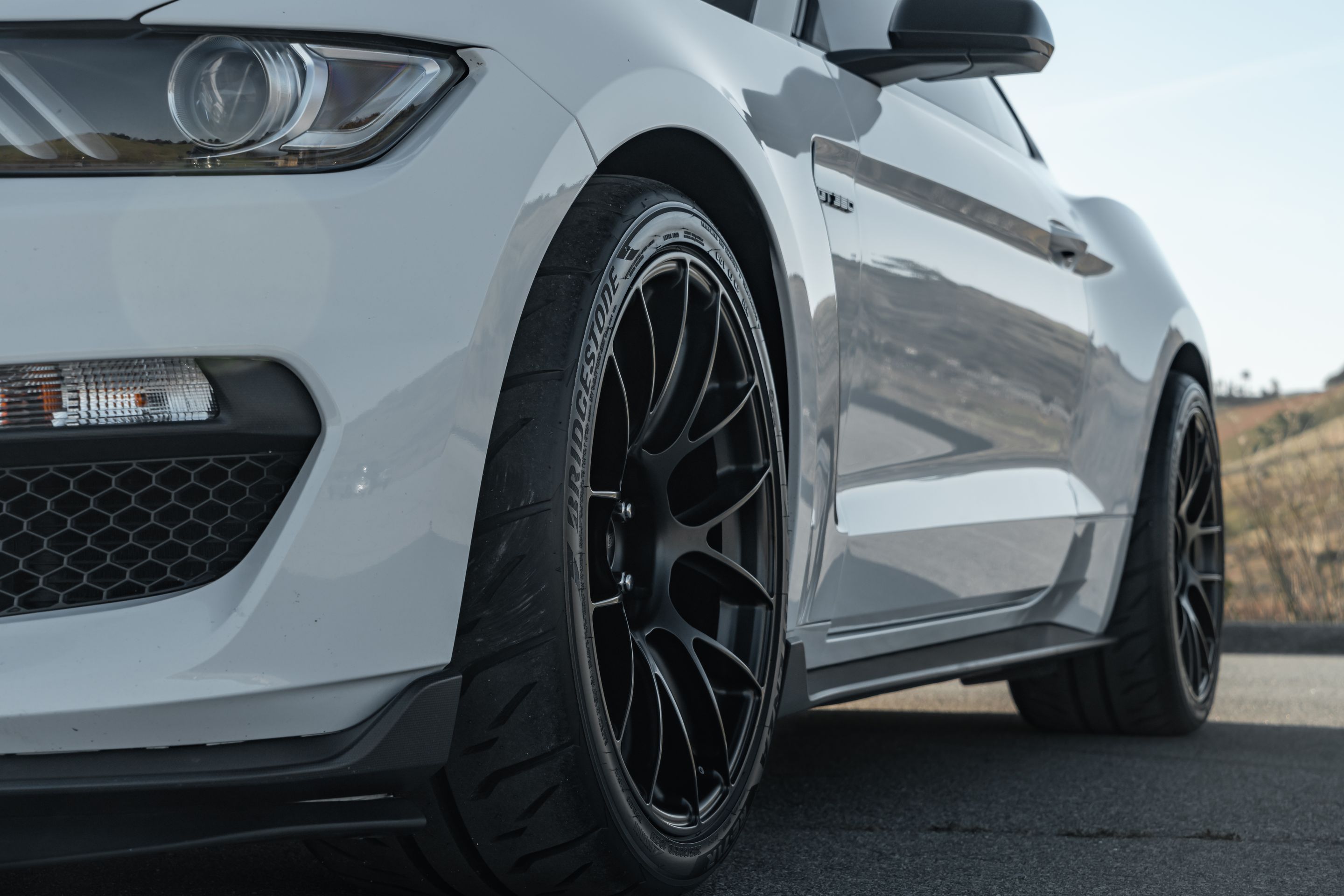 White Ford S550 Mustang GT350 with 19" EC-7RS Apex wheels in Satin Black