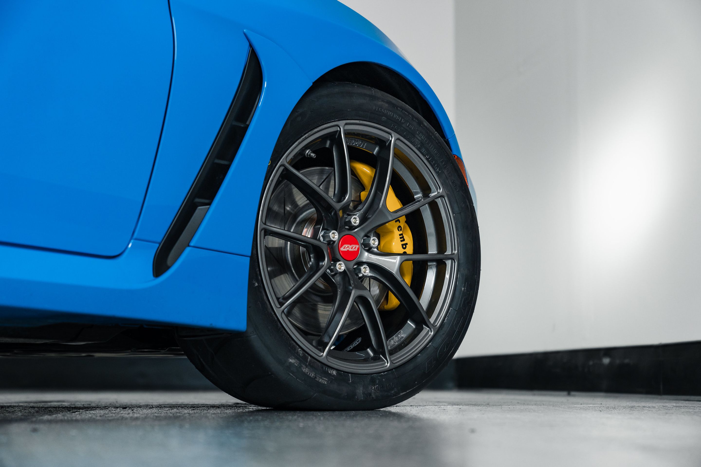 Blue Toyota GR86 with 17" VS-5RS Apex wheels in Anthracite