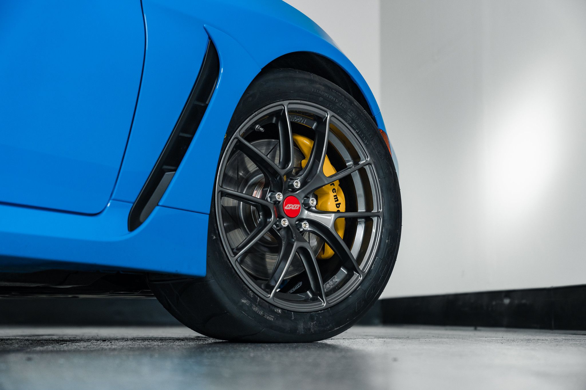 Blue Toyota GR86 with 17" VS-5RS Apex wheels in Anthracite