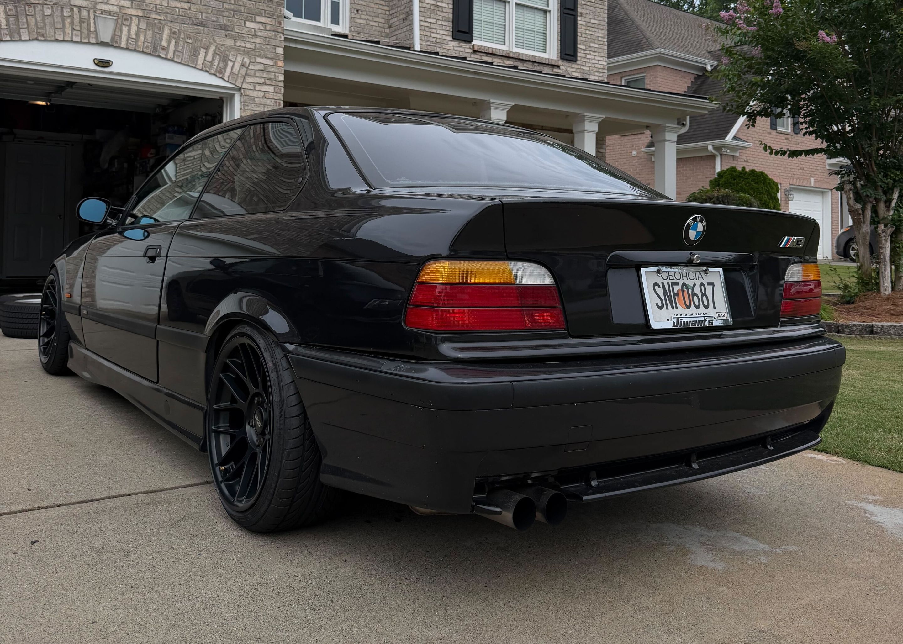 Black BMW E36 M3 with 17" ARC-8 Apex wheels in Satin Black