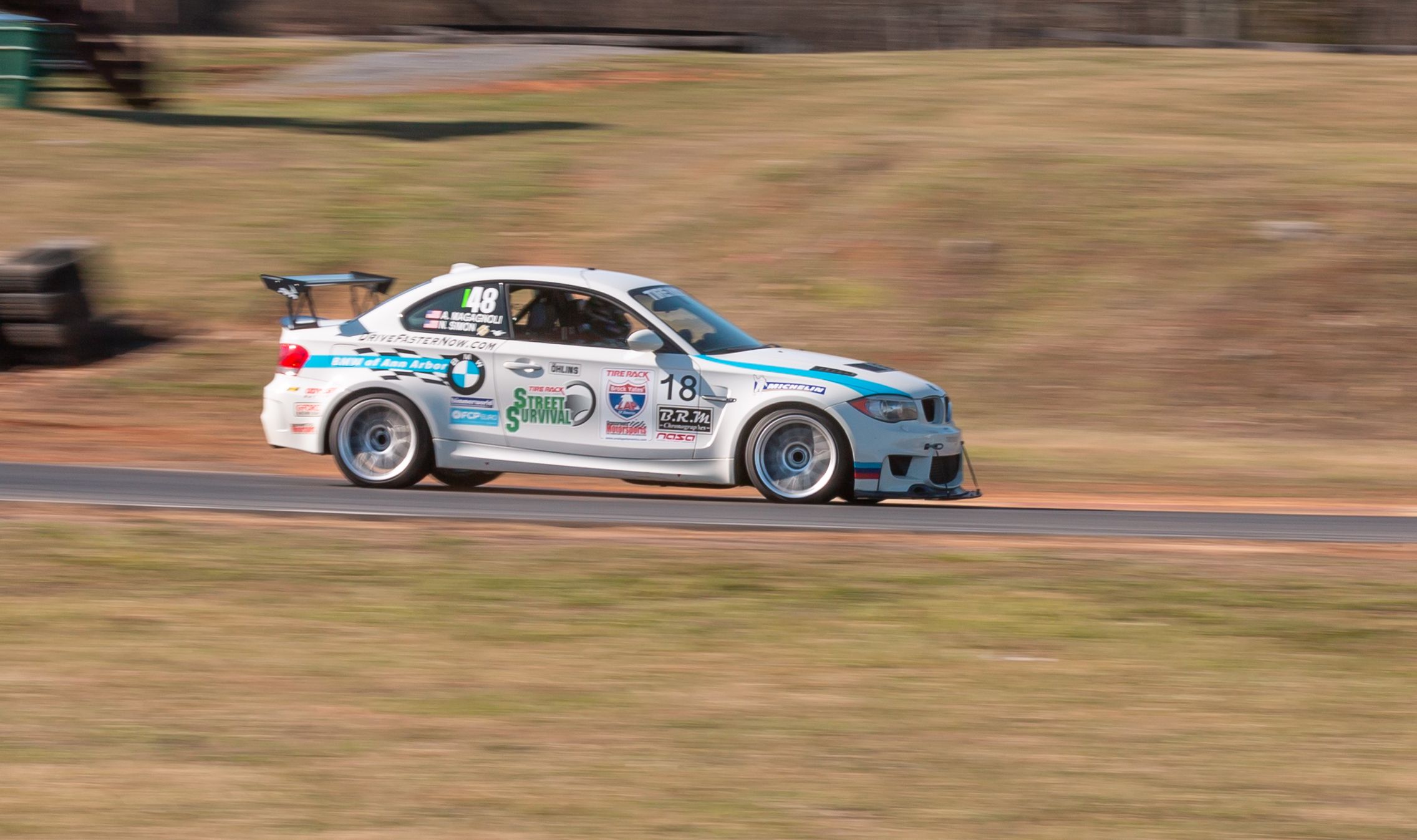 White BMW E82 1M with 18" ARC-8 Apex wheels in Hyper Silver