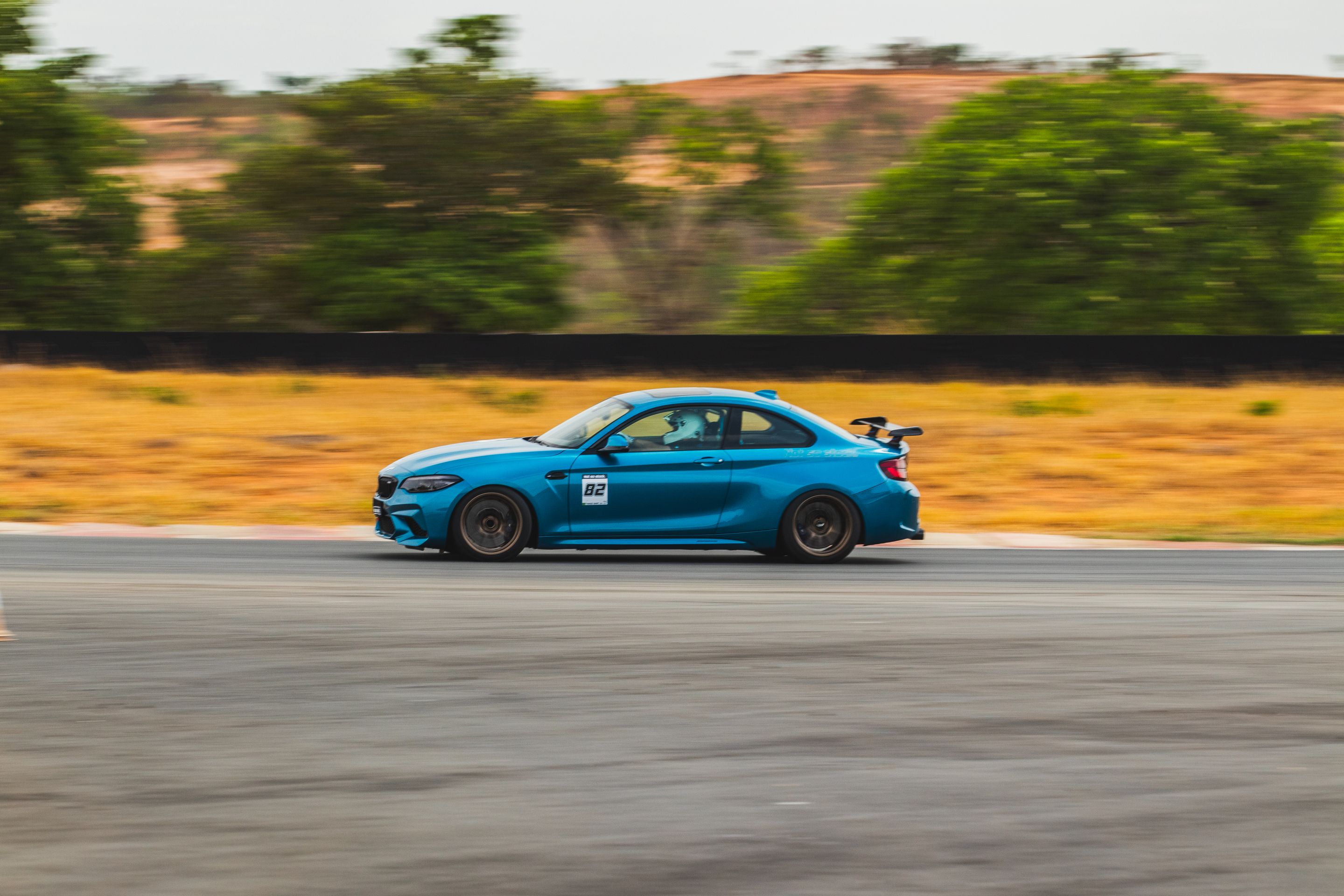 Blue BMW F87 M2 with 18" SM-10 Apex wheels in Custom Finish