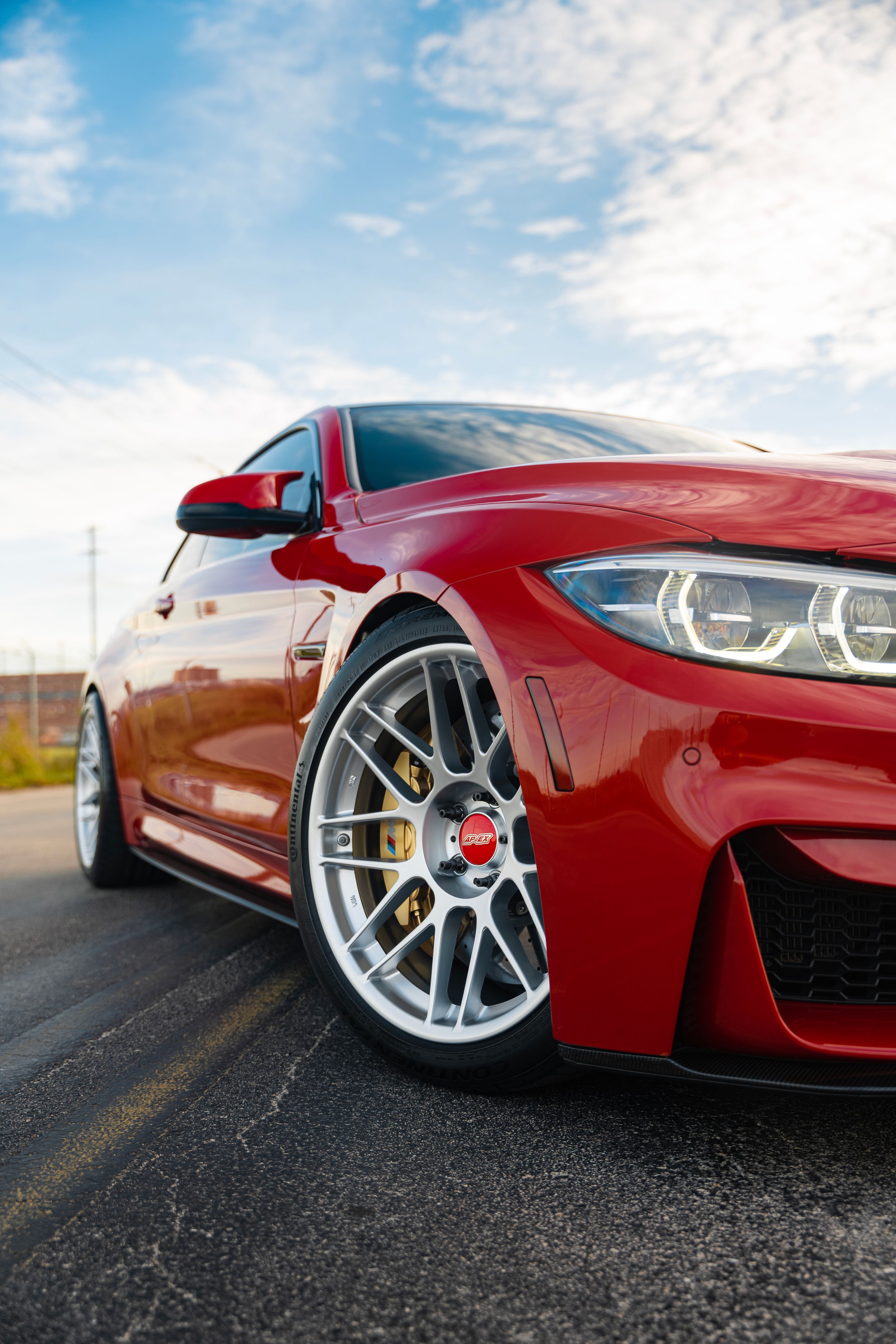 Red BMW F82 Coupe M4 with 19" ARC-8 Apex wheels in Hyper Silver