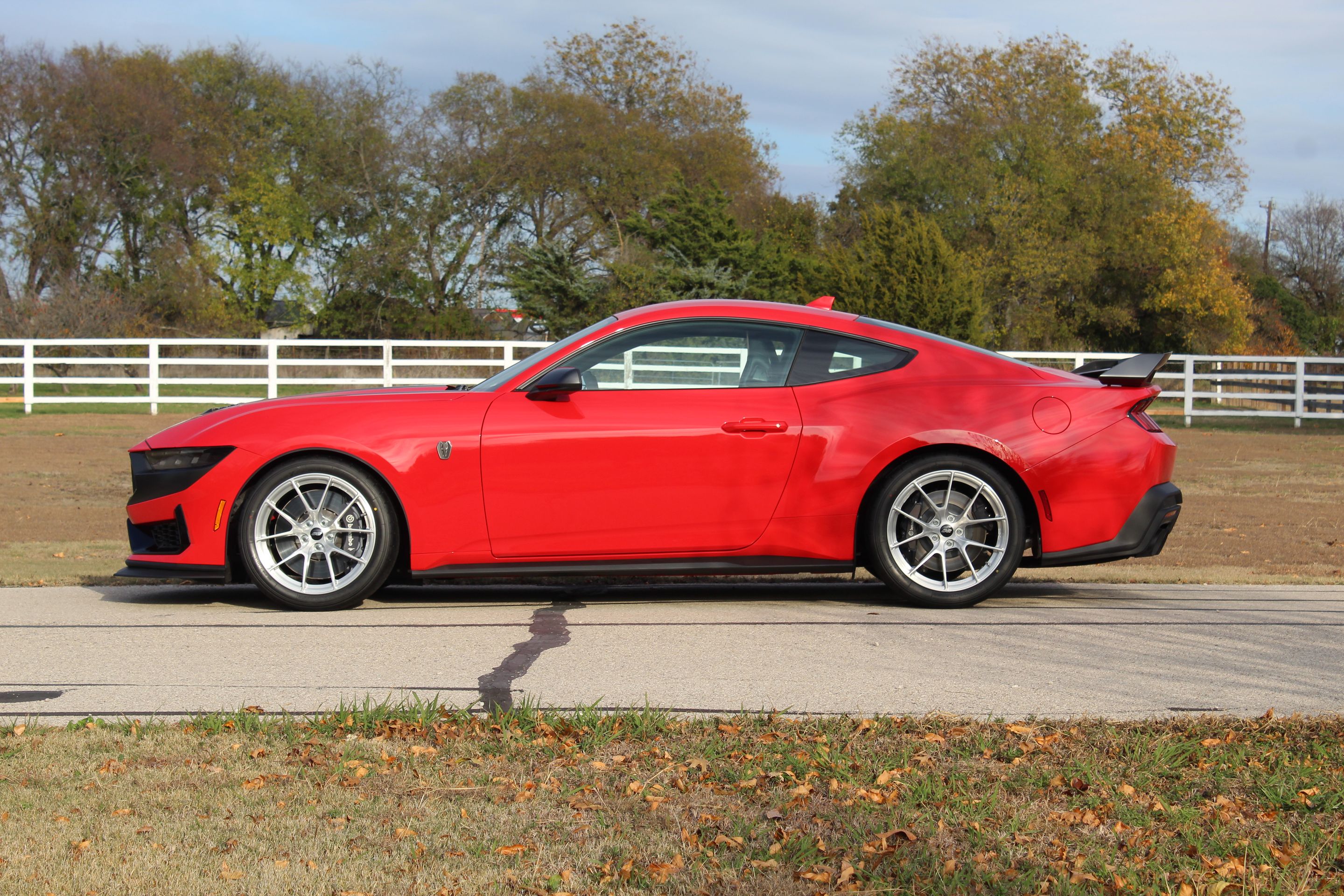 Red Ford S650 Mustang Dark Horse with 19" VS-5RS Apex wheels in Brushed Clear