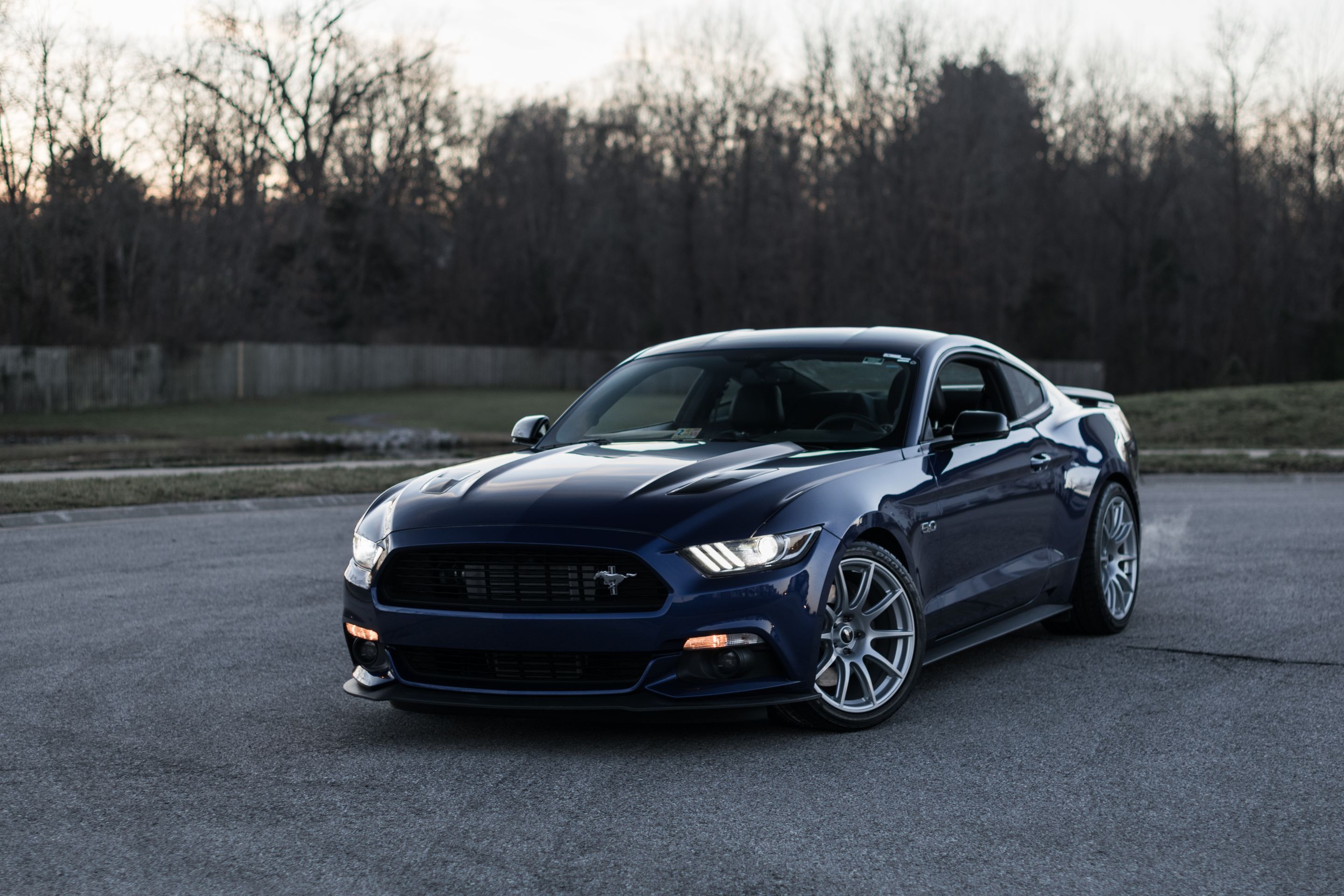Blue Ford S550 Mustang GT with 19" SM-10 Apex wheels in Race Silver