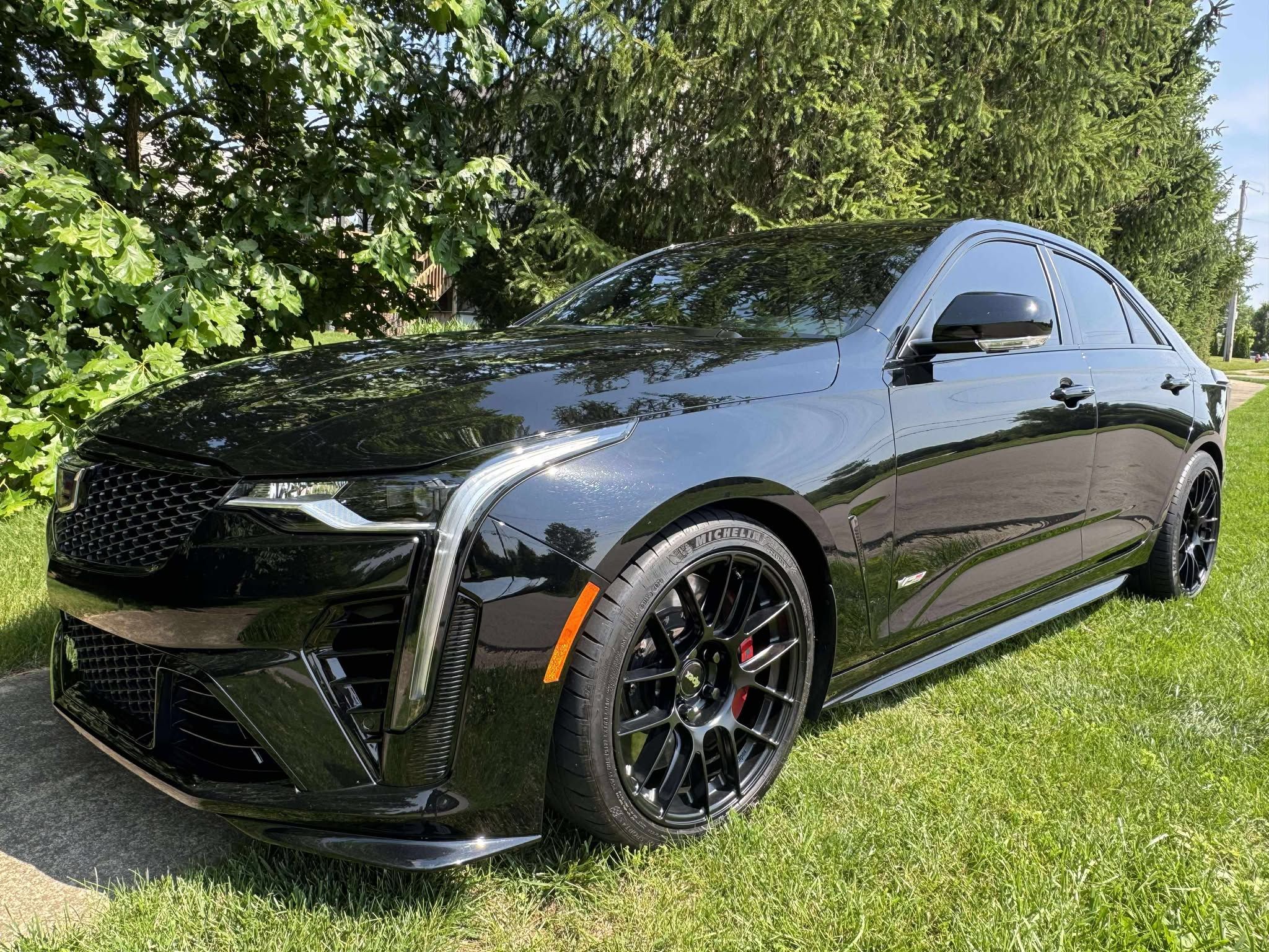 Black Cadillac CT4-V Blackwing with 18" EC-7RS Apex wheels in Satin Black