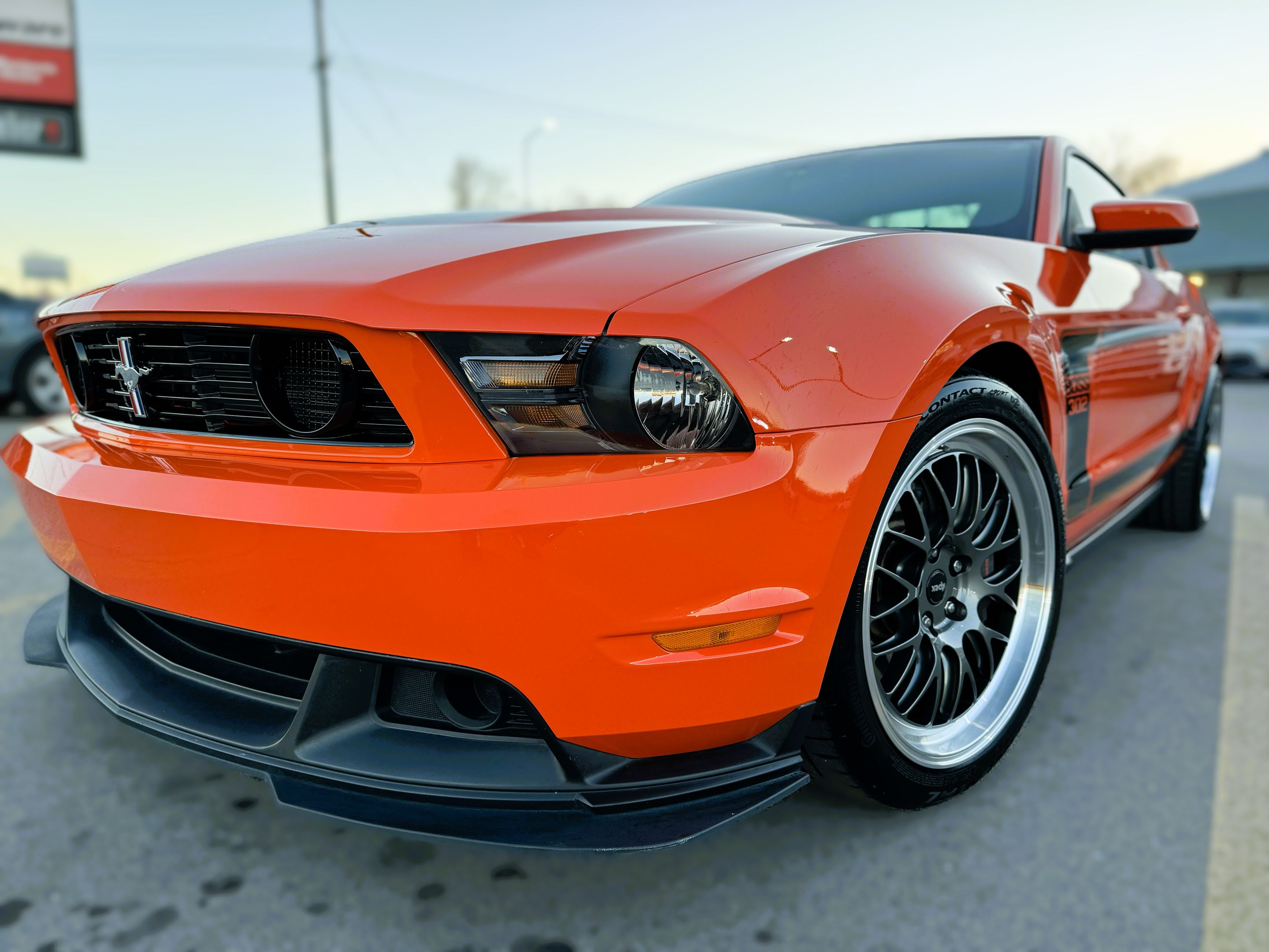 Orange Ford S197 Mustang Boss 302 with 19" ML-10RT Apex wheels in Machined Lip Anthracite