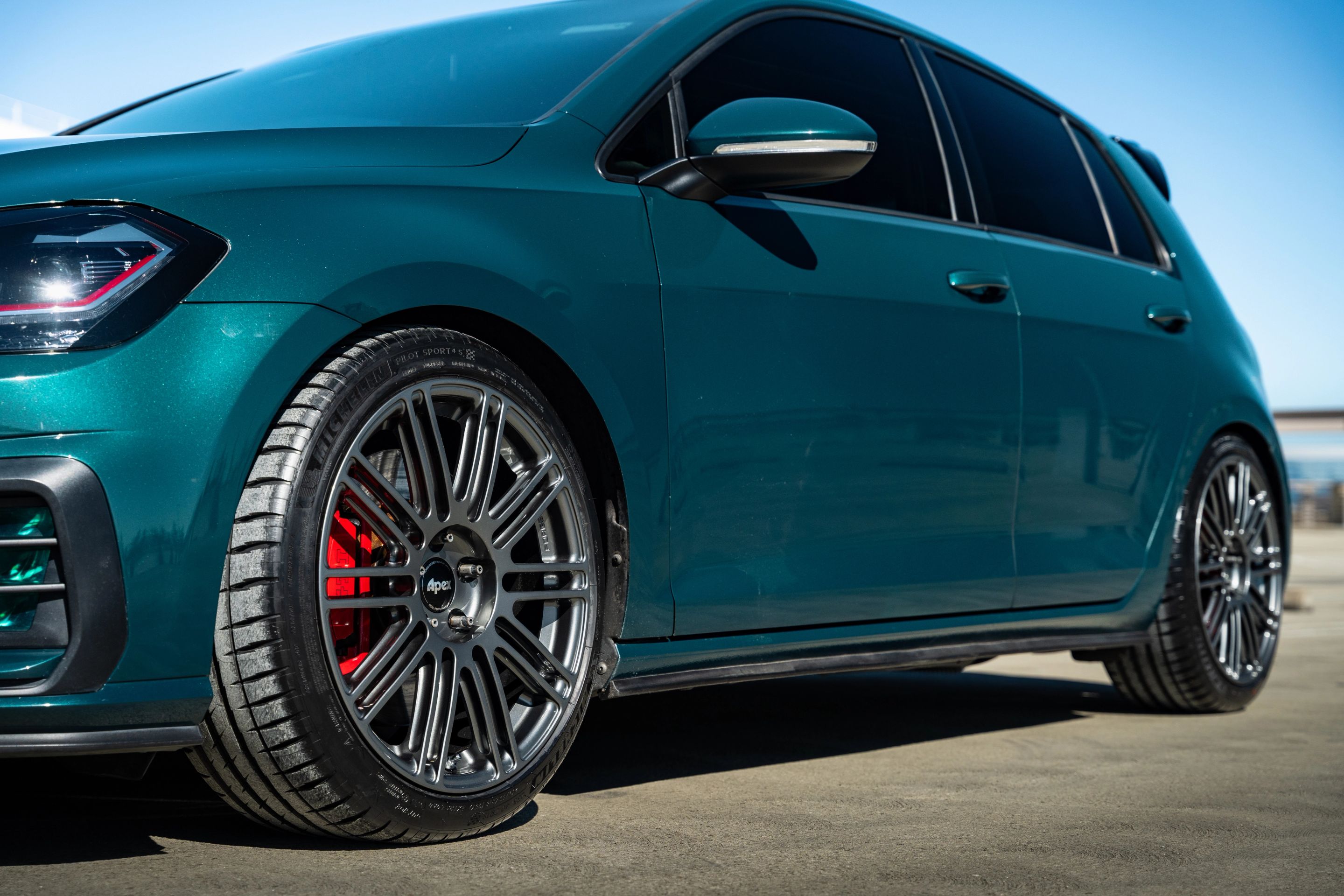 Green VW MK7 GTI with 18" TC-10RT Apex wheels in Anthracite