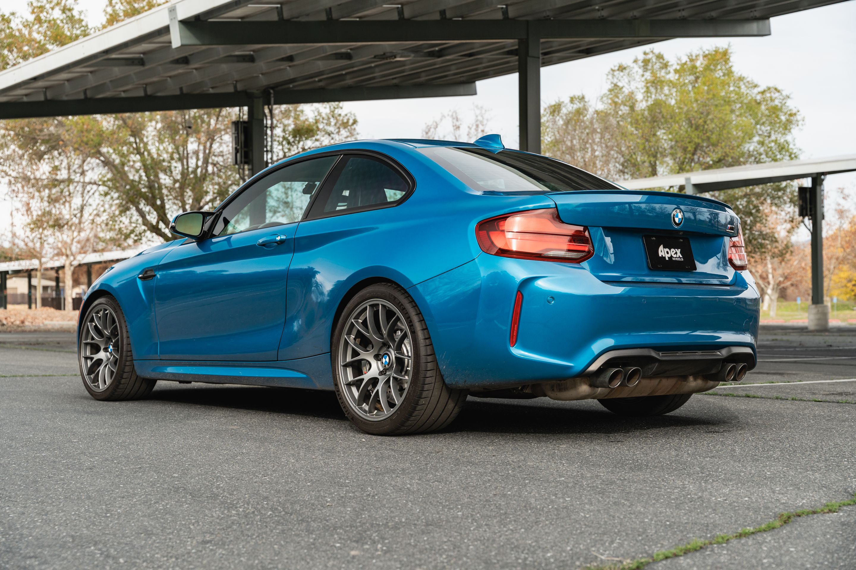 Blue BMW F87 M2 with 19" EC-7 Apex wheels in Anthracite