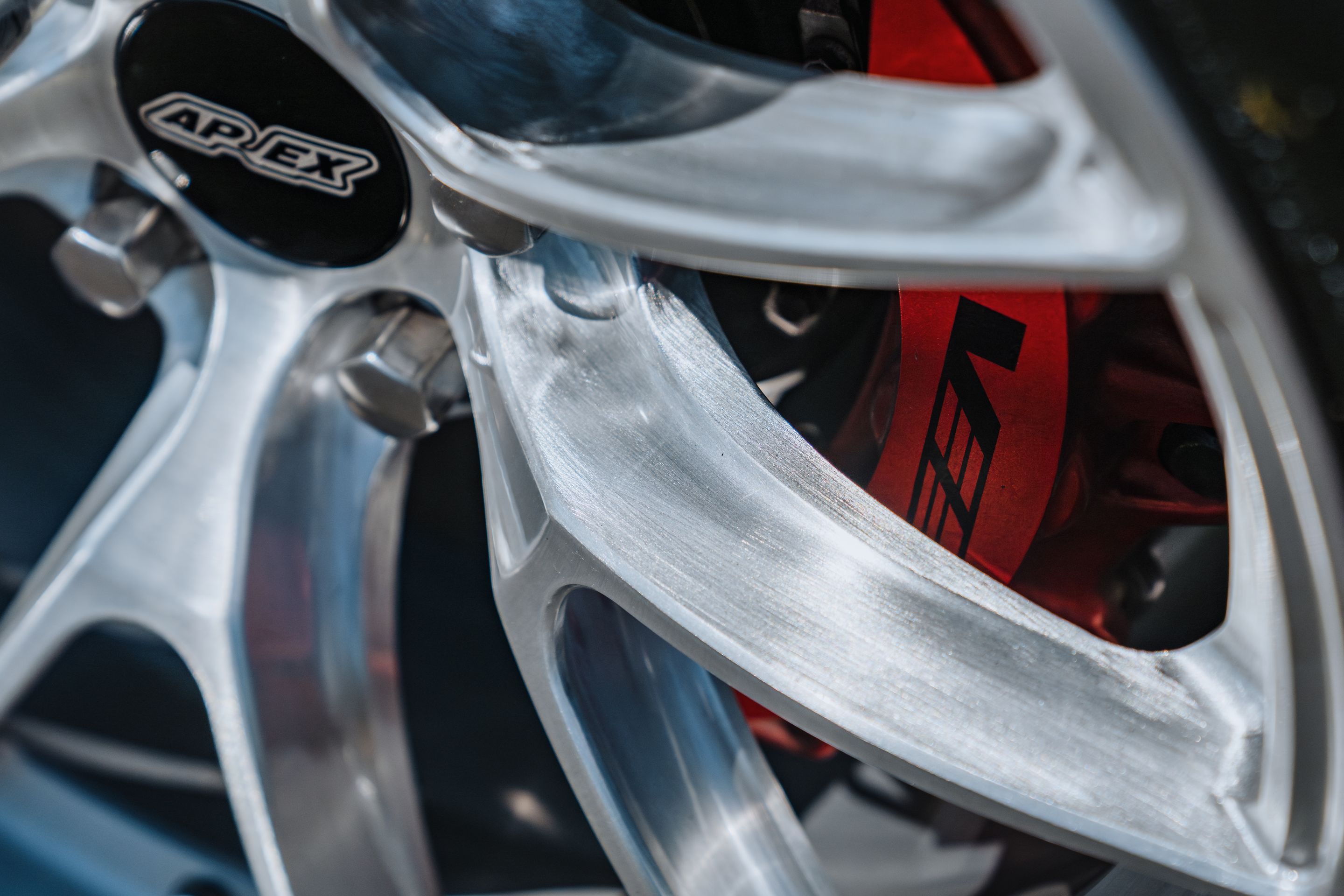 Orange Cadillac CT4-V Blackwing with 19" VS-5RS Apex wheels in Brushed Clear