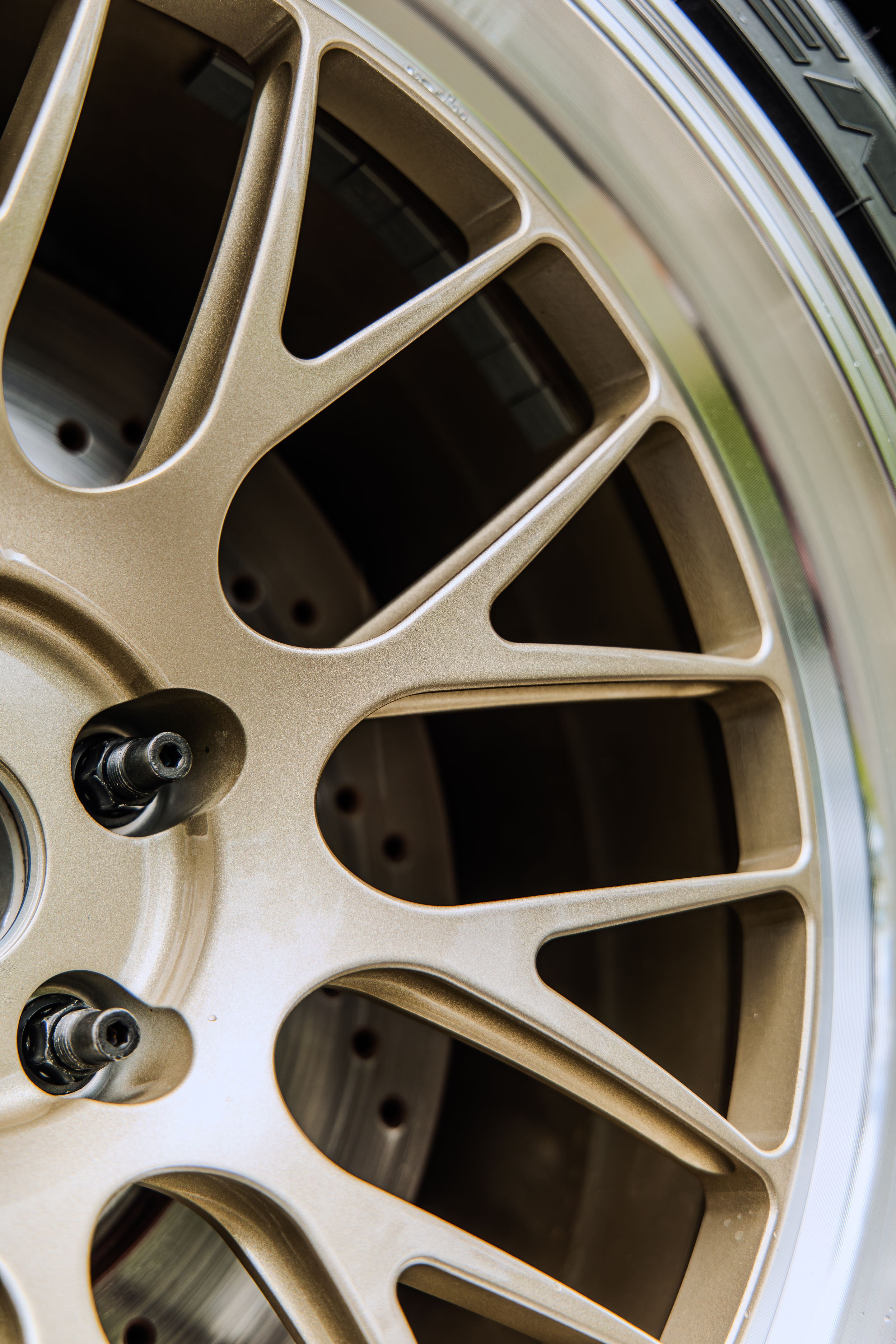 Grey BMW G87 M2 with 19" ML-10RT Apex wheels in Machined Lip Gloss Motorsport Gold