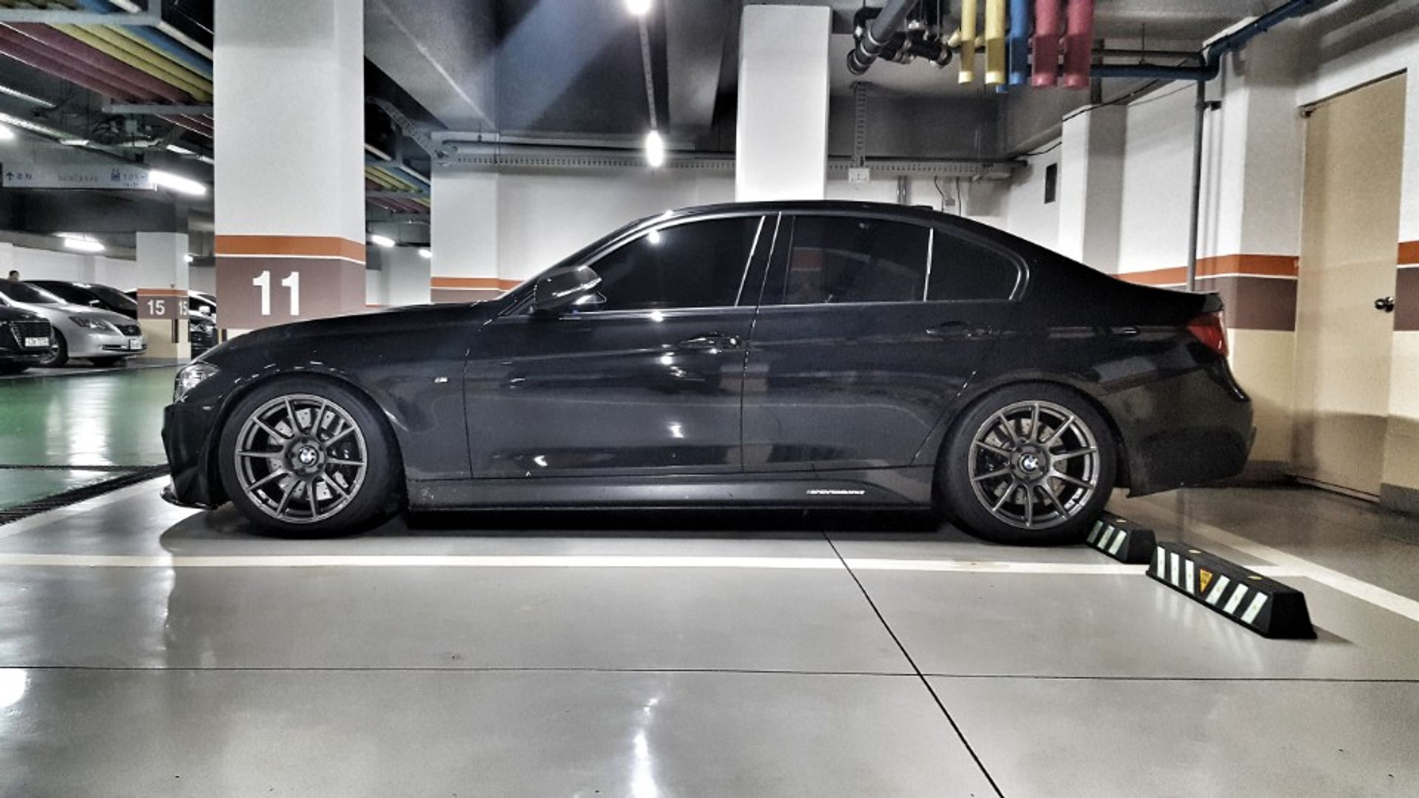 Black BMW F30 Sedan 3 Series with 18" SM-10 Apex wheels in Anthracite