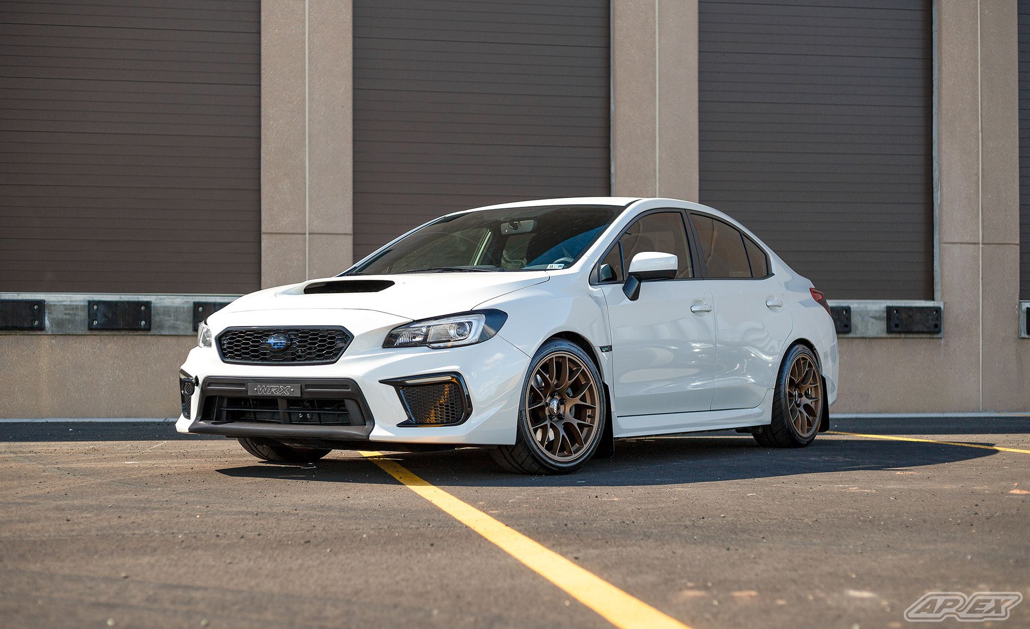 White Subaru VA WRX with 18" EC-7 Apex wheels in Satin Bronze