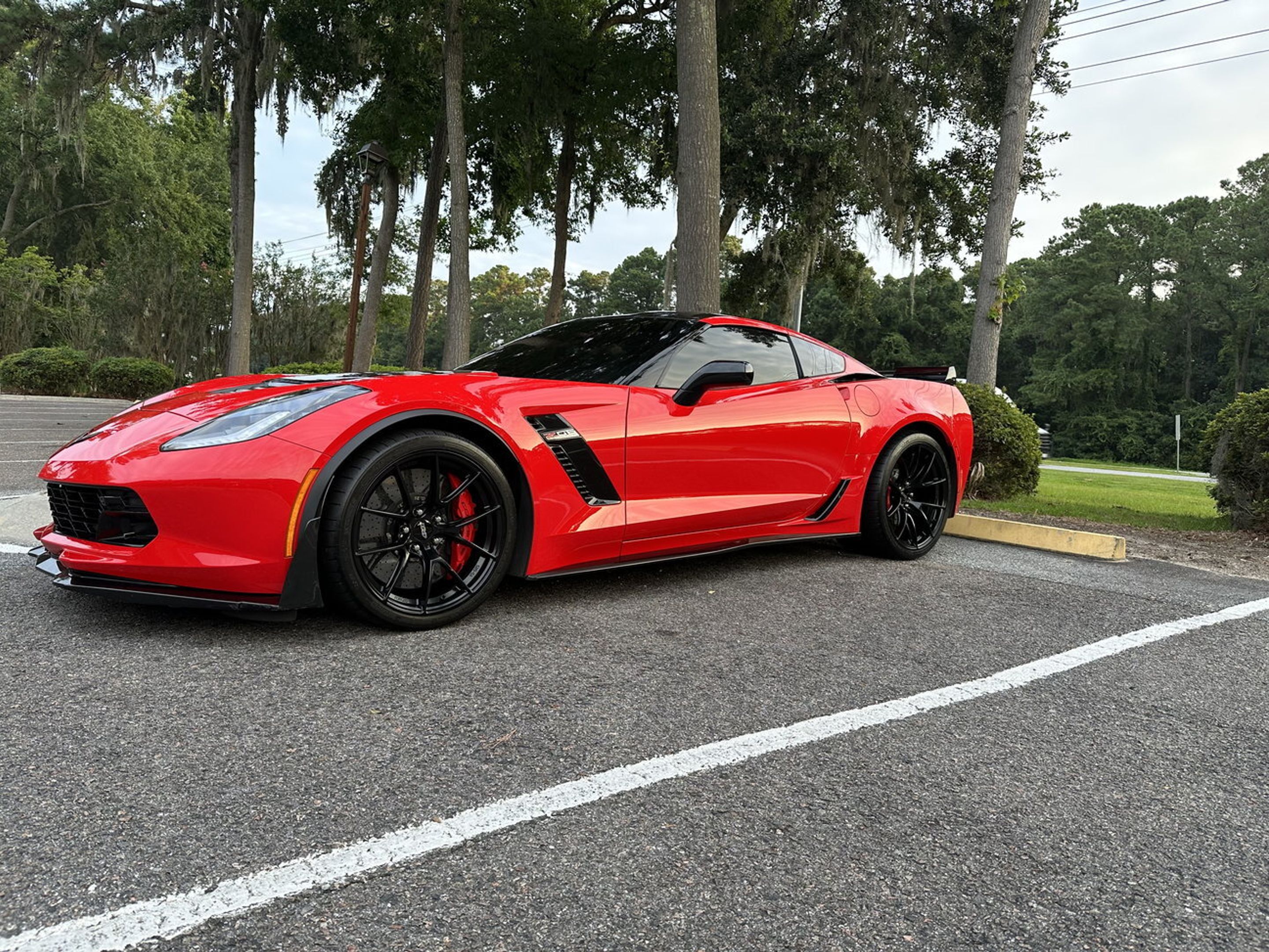 Red Chevrolet C7 Corvette Z06 with 19"/20" VS-5RS Apex wheels in Satin Black