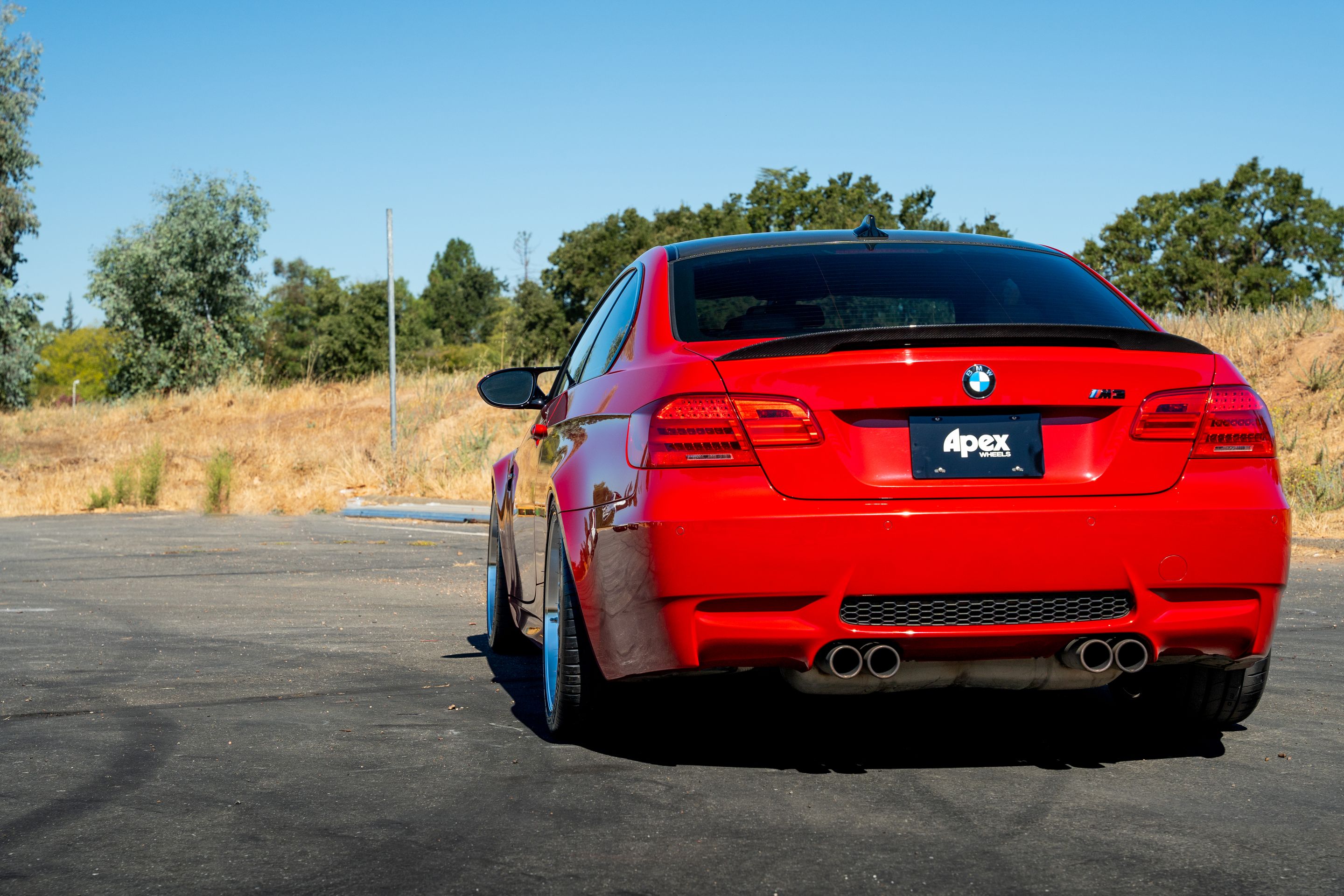 Red BMW E92 Coupe M3 with 19" ML-10RT Apex wheels in Machined Lip Race Silver