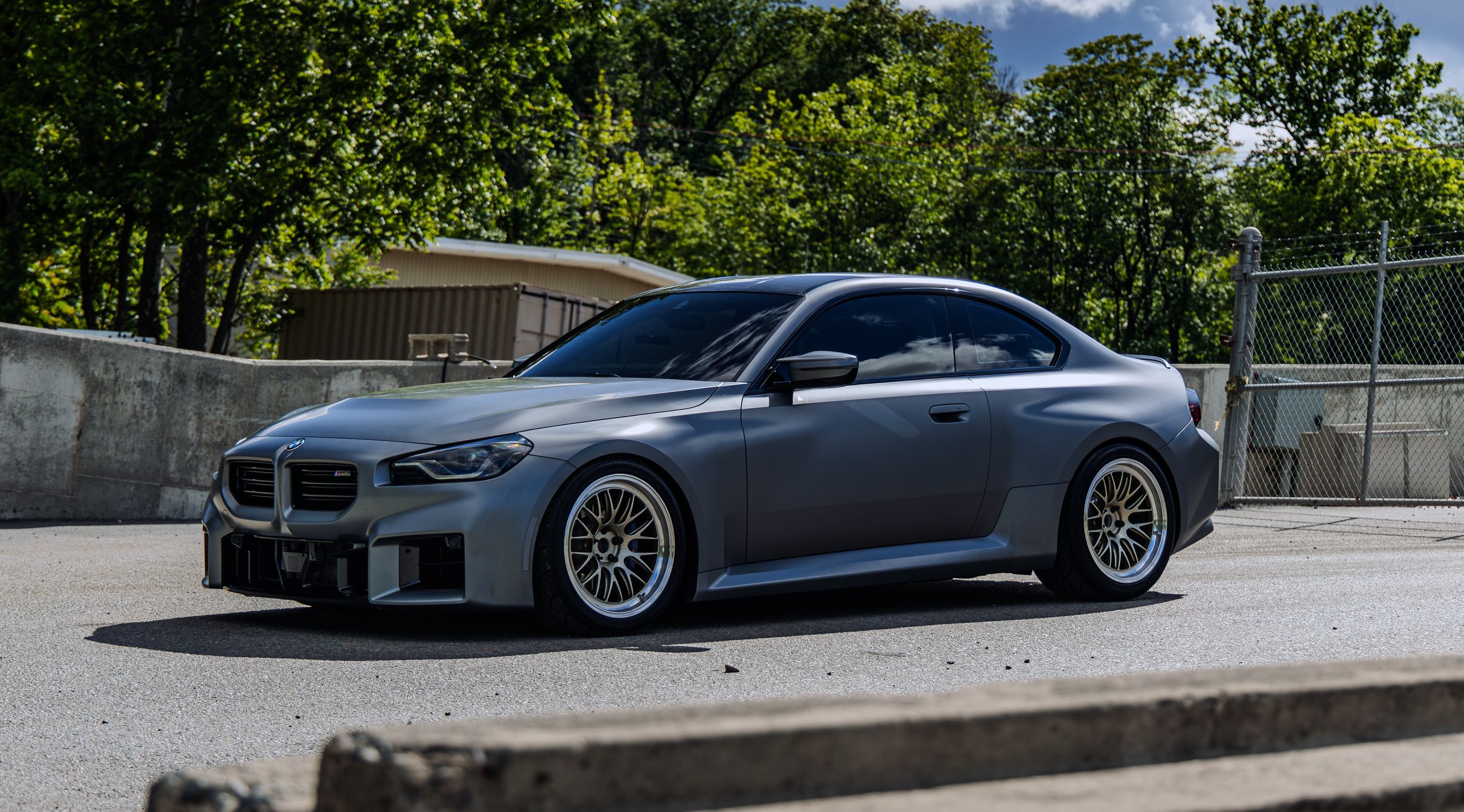 Grey BMW G87 M2 with 19" ML-10RT Apex wheels in Machined Lip Gloss Motorsport Gold