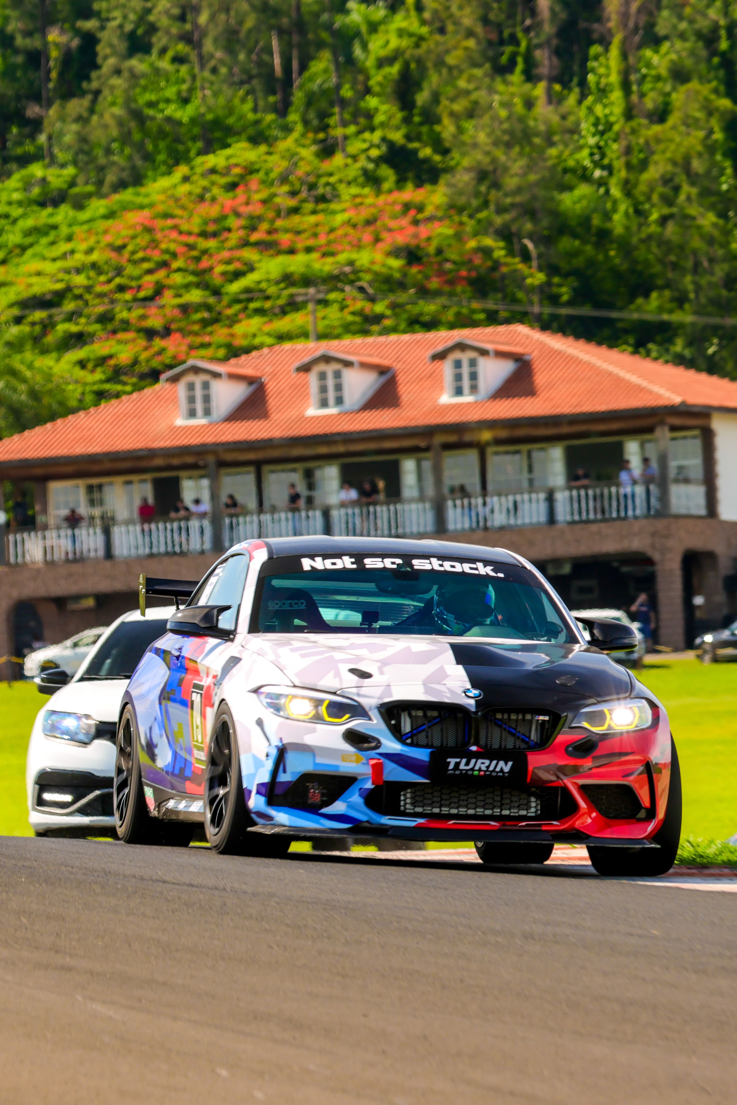 Multicolor BMW F87 M2 with 18" EC-7 Apex wheels in Satin Black