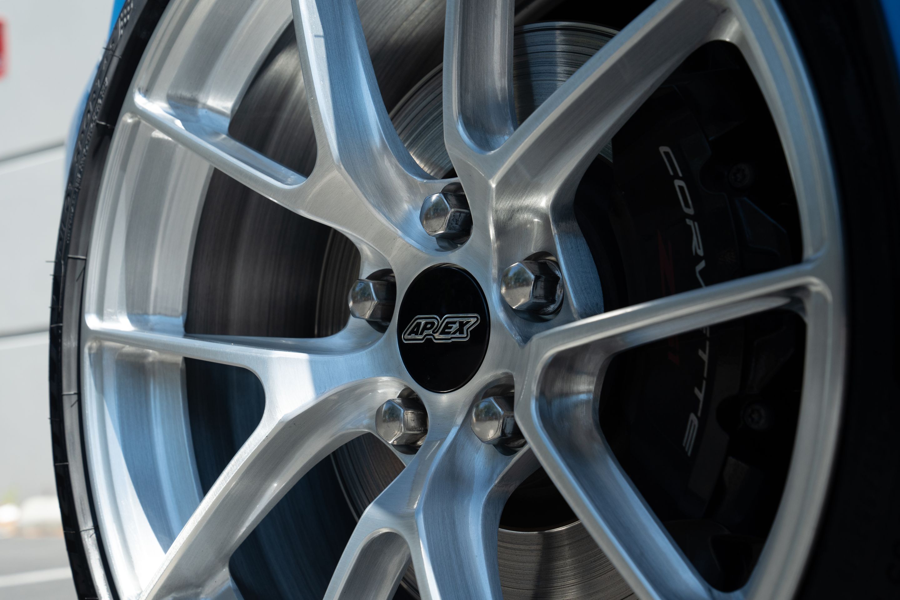 Blue Chevrolet C8 Corvette Stingray/Z51 with 19"/20" VS-5RS Apex wheels in Brushed Clear