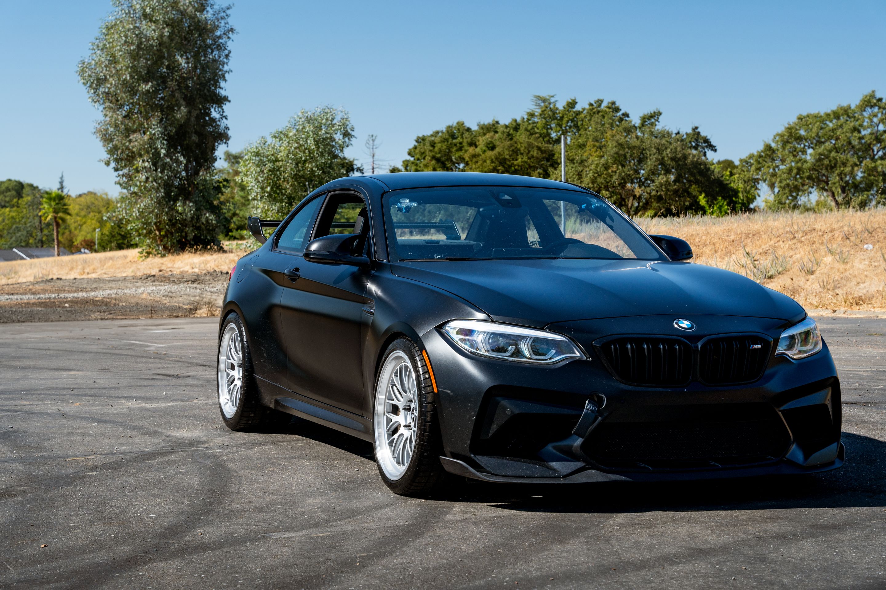 Black BMW F87 M2 with 19" ML-10RT Apex wheels in Machined Lip Race Silver