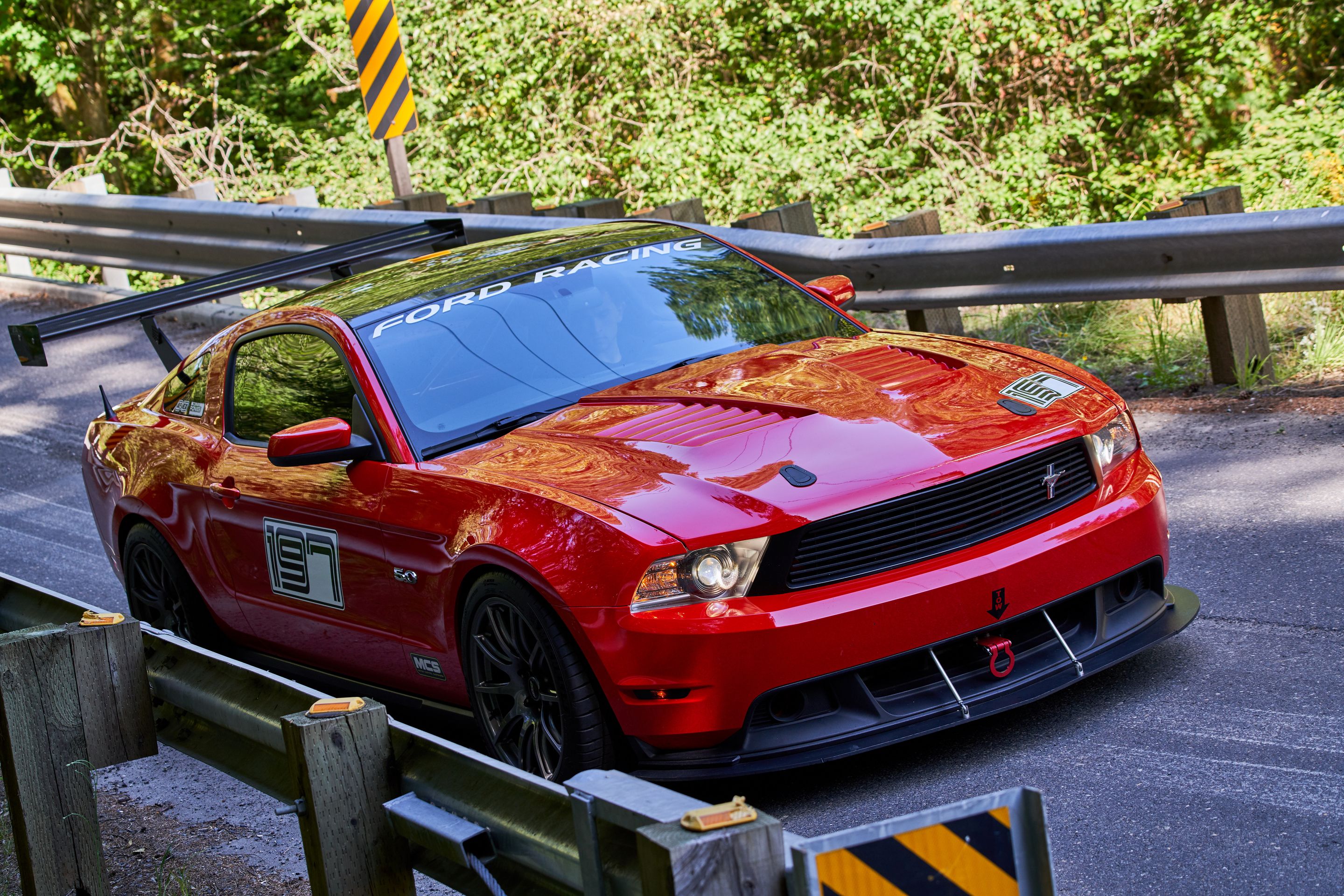 Red Ford S197 Mustang GT with 19" SM-10 Apex wheels in Anthracite