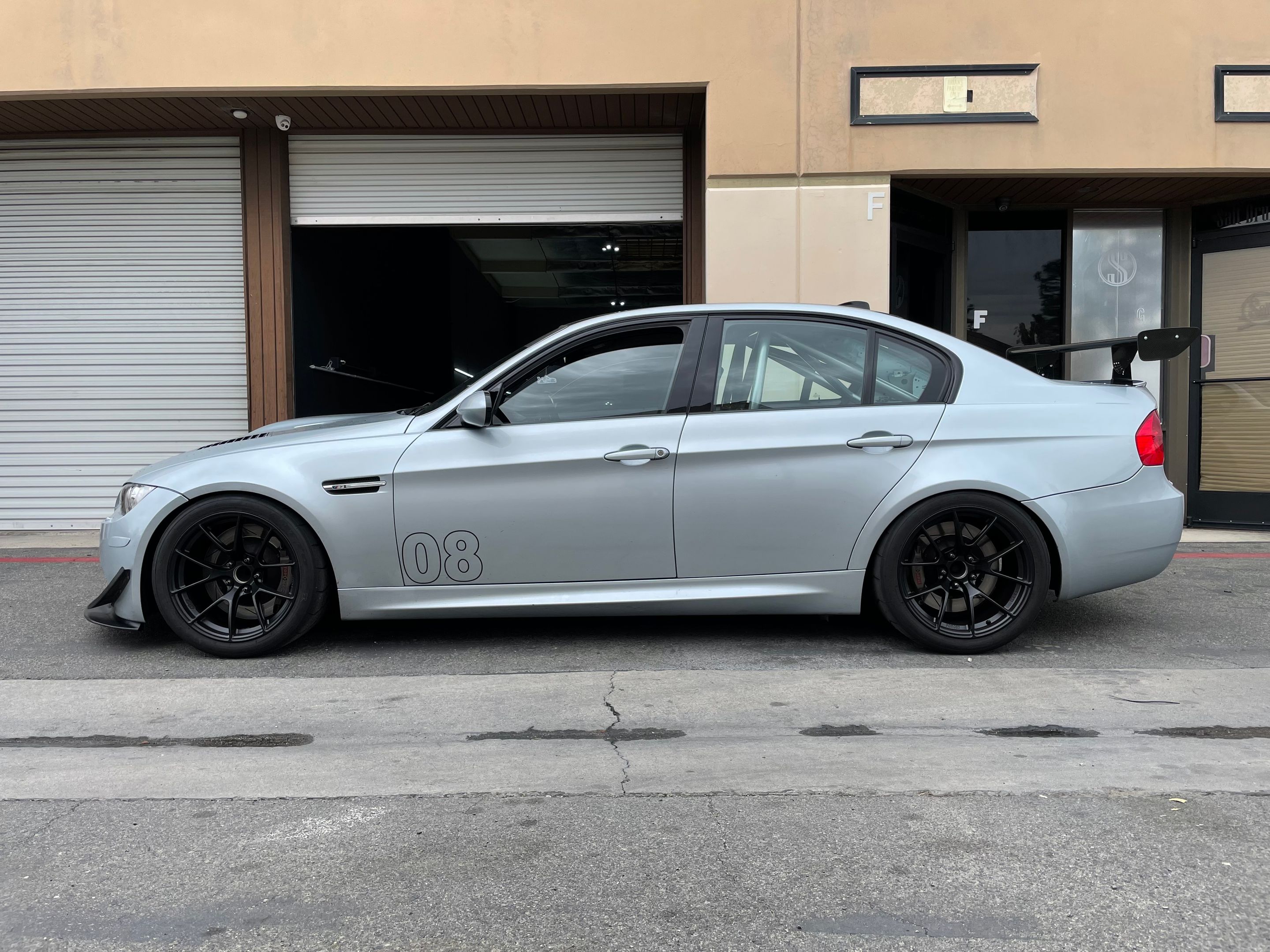 Silver BMW E90 Sedan M3 with 18" VS-5RS Apex wheels in Satin Black