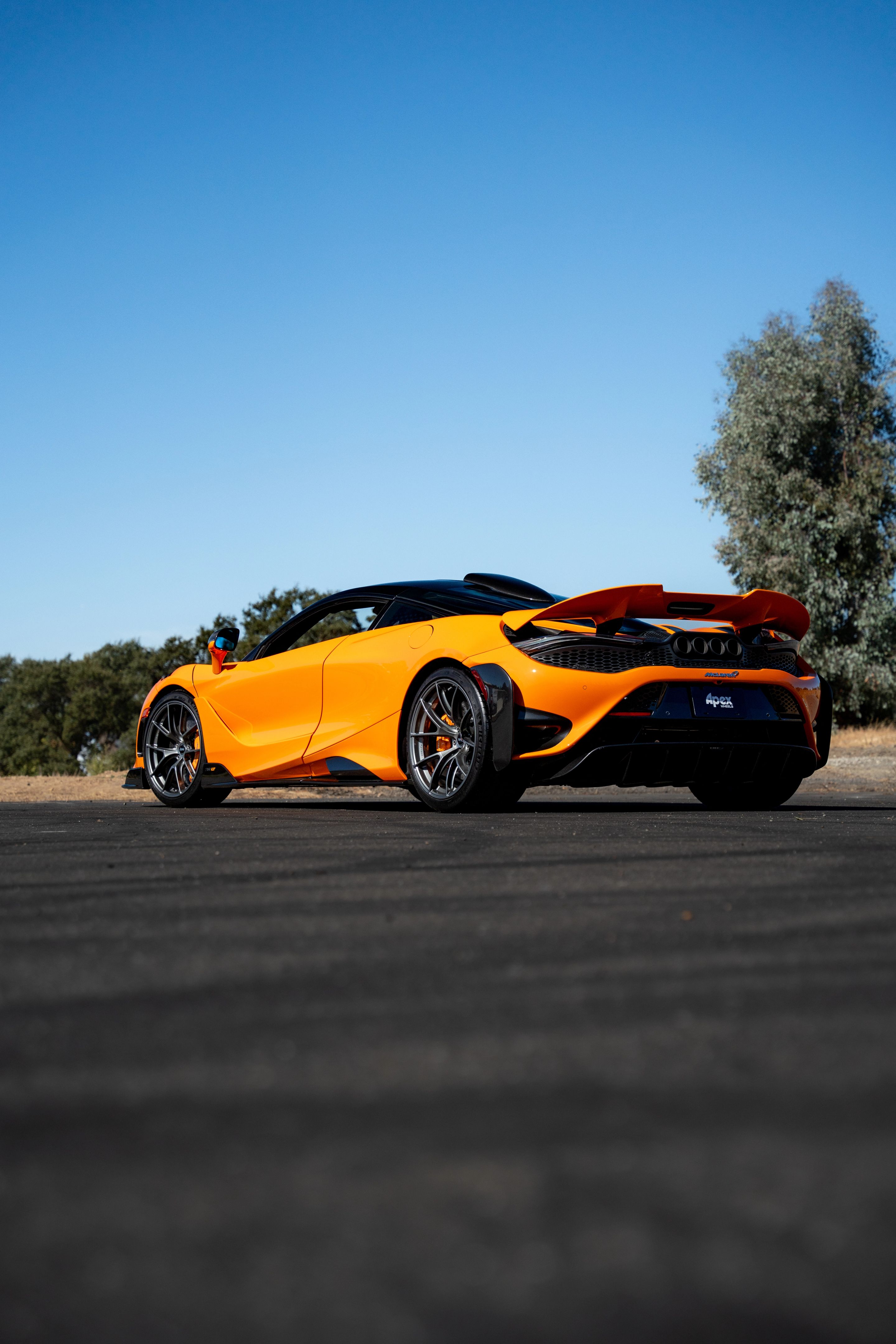 Orange McLaren 765LT with 19"/20" VS-5RS Apex wheels in Anthracite