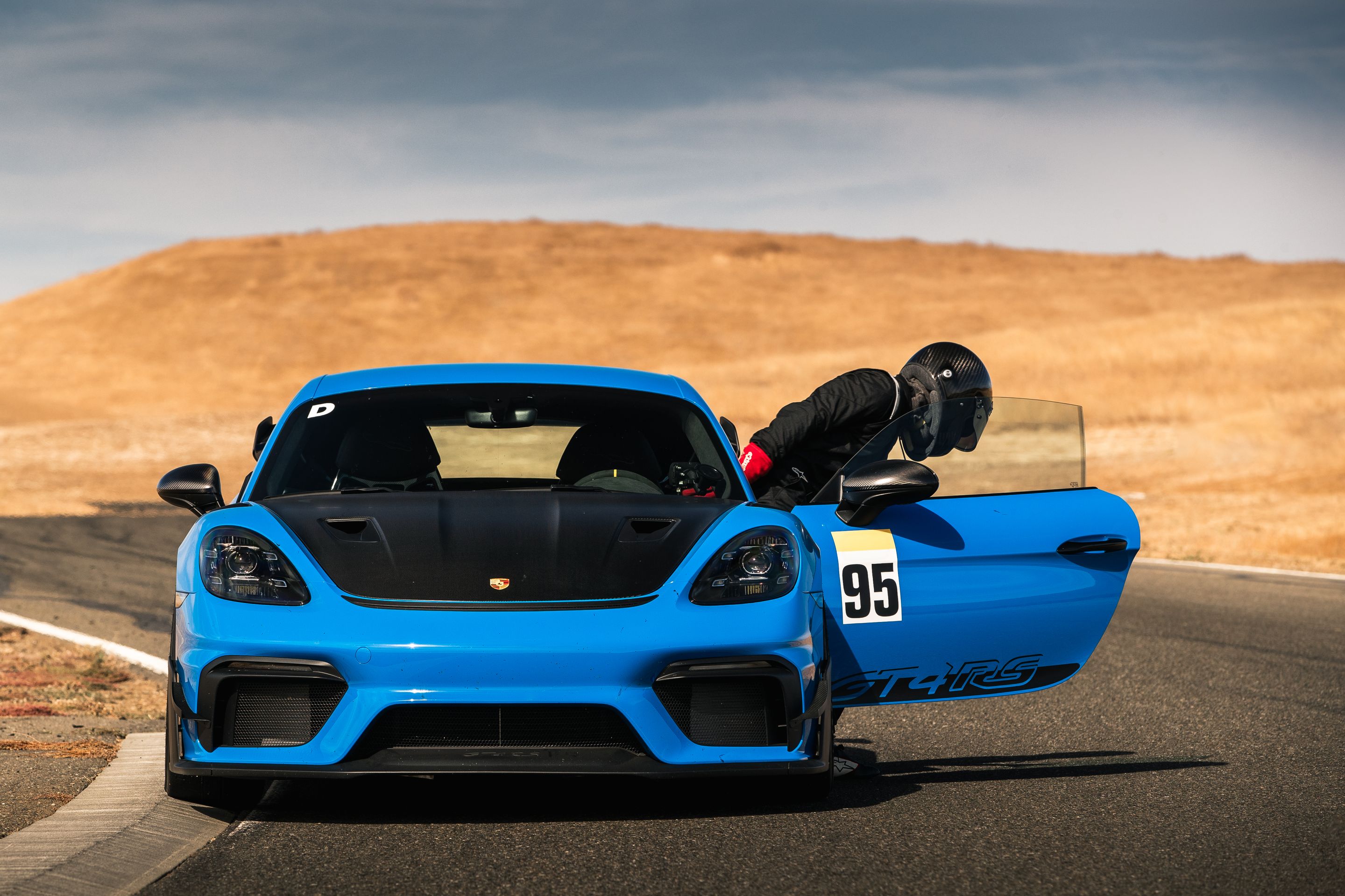 Blue Porsche 718 Cayman GT4 RS with 19" EC-7RS Apex wheels in Race Silver