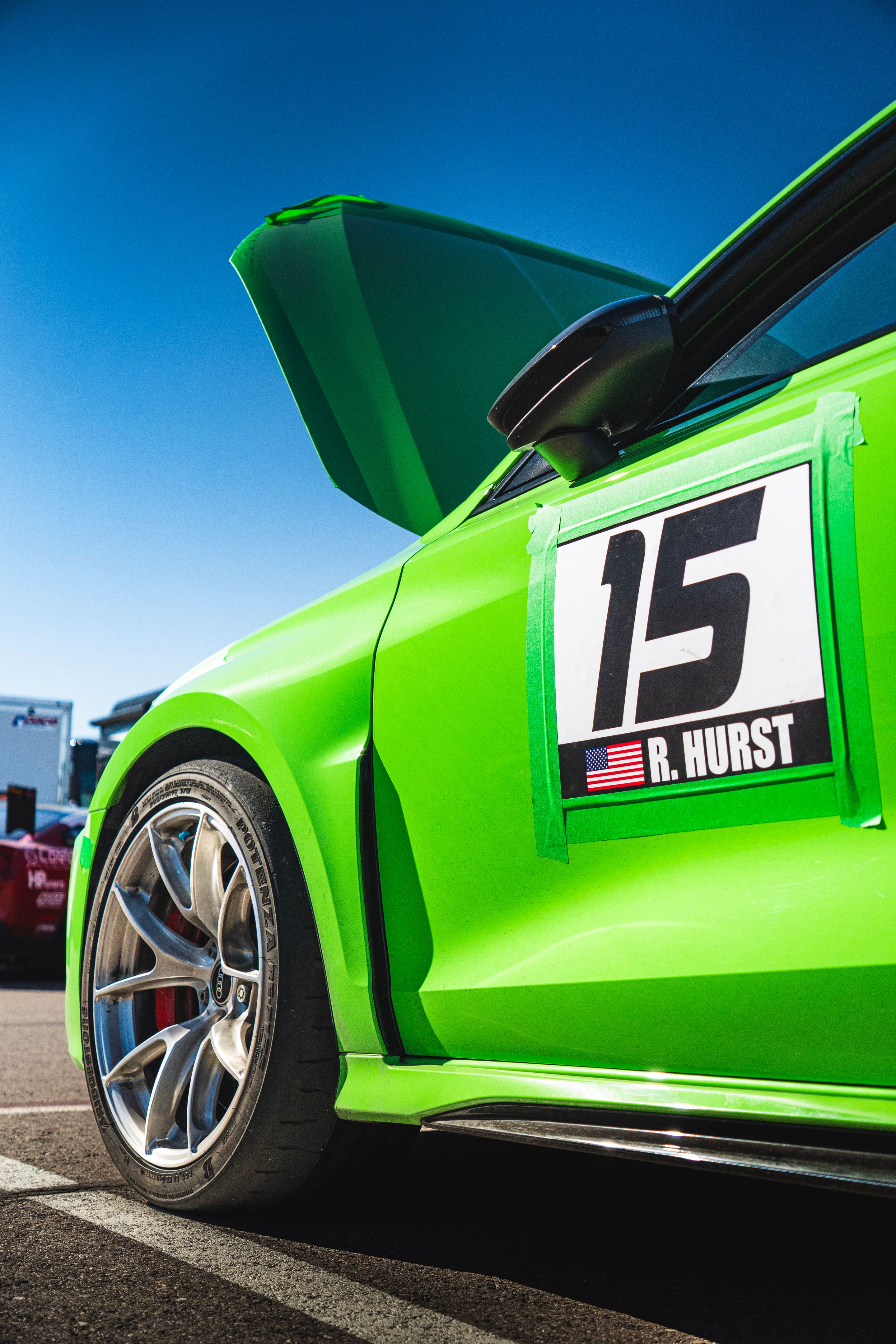 Green Audi 8Y RS 3 with 18" VS-5RS Apex wheels in Brushed Clear