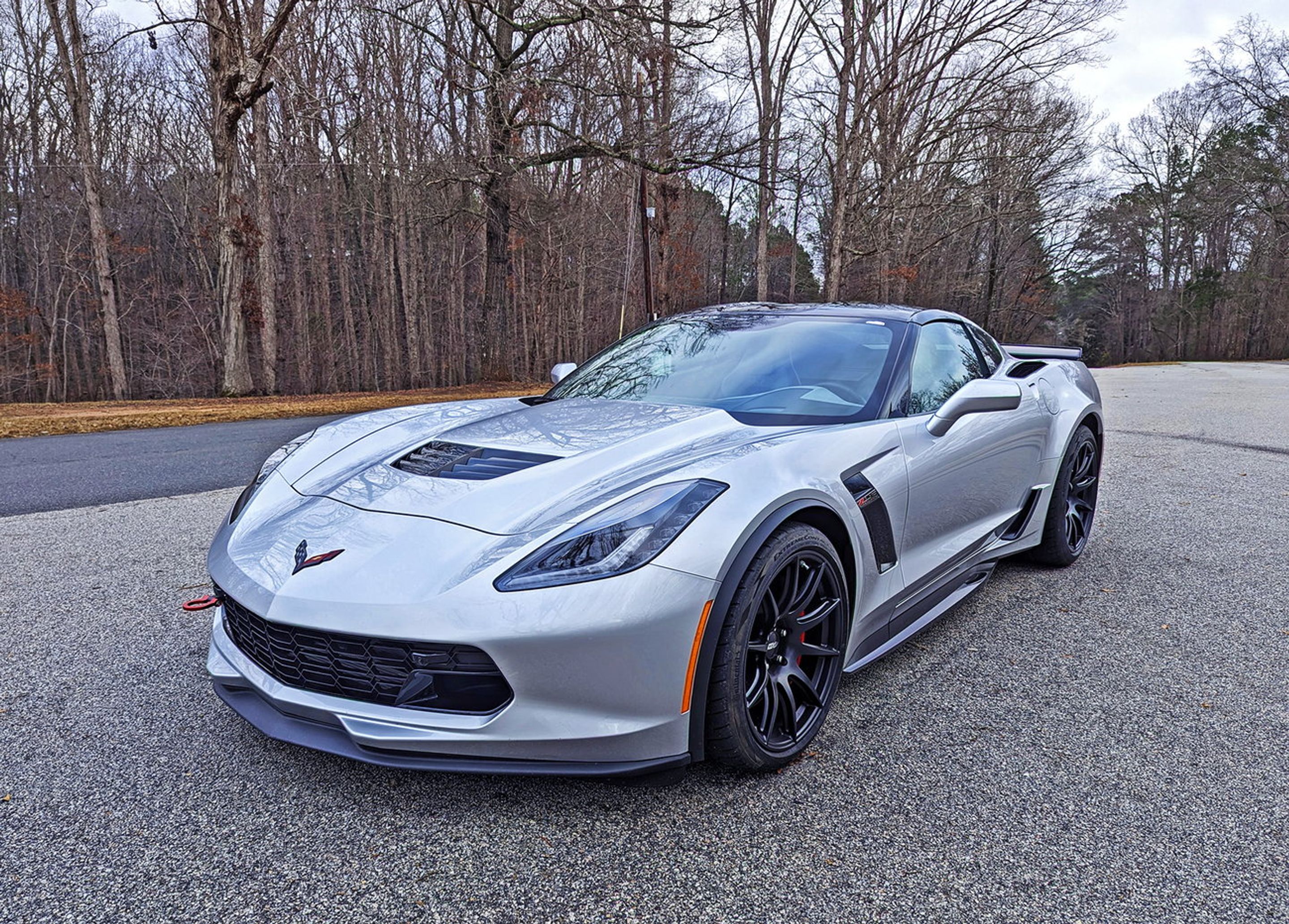 Silver Chevrolet C7 Corvette Z06 with 19" SM-10 Apex wheels in Satin Black