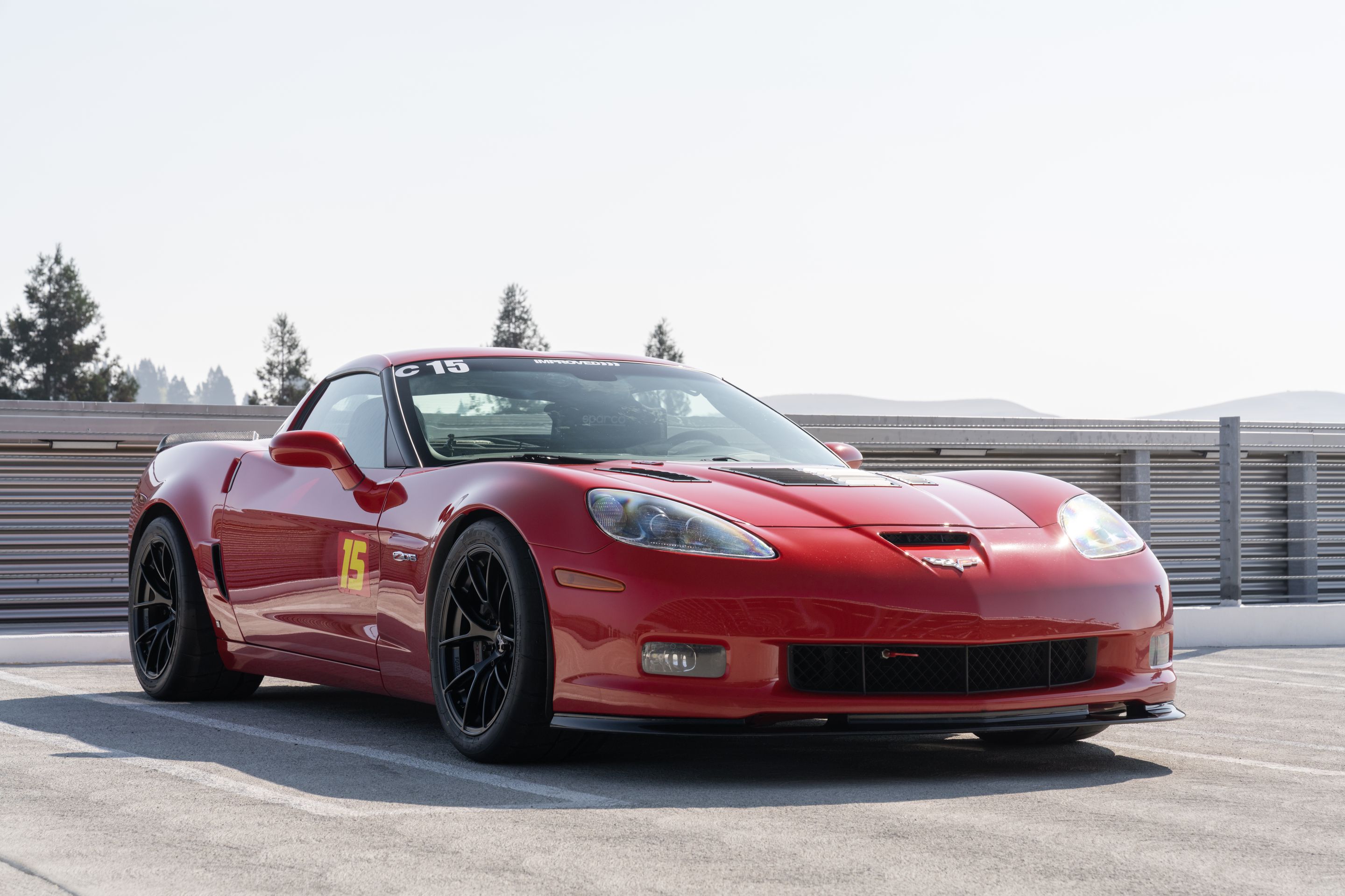 Red Chevrolet C6 Corvette Z06 with 18" VS-5RS Apex wheels in Satin Black
