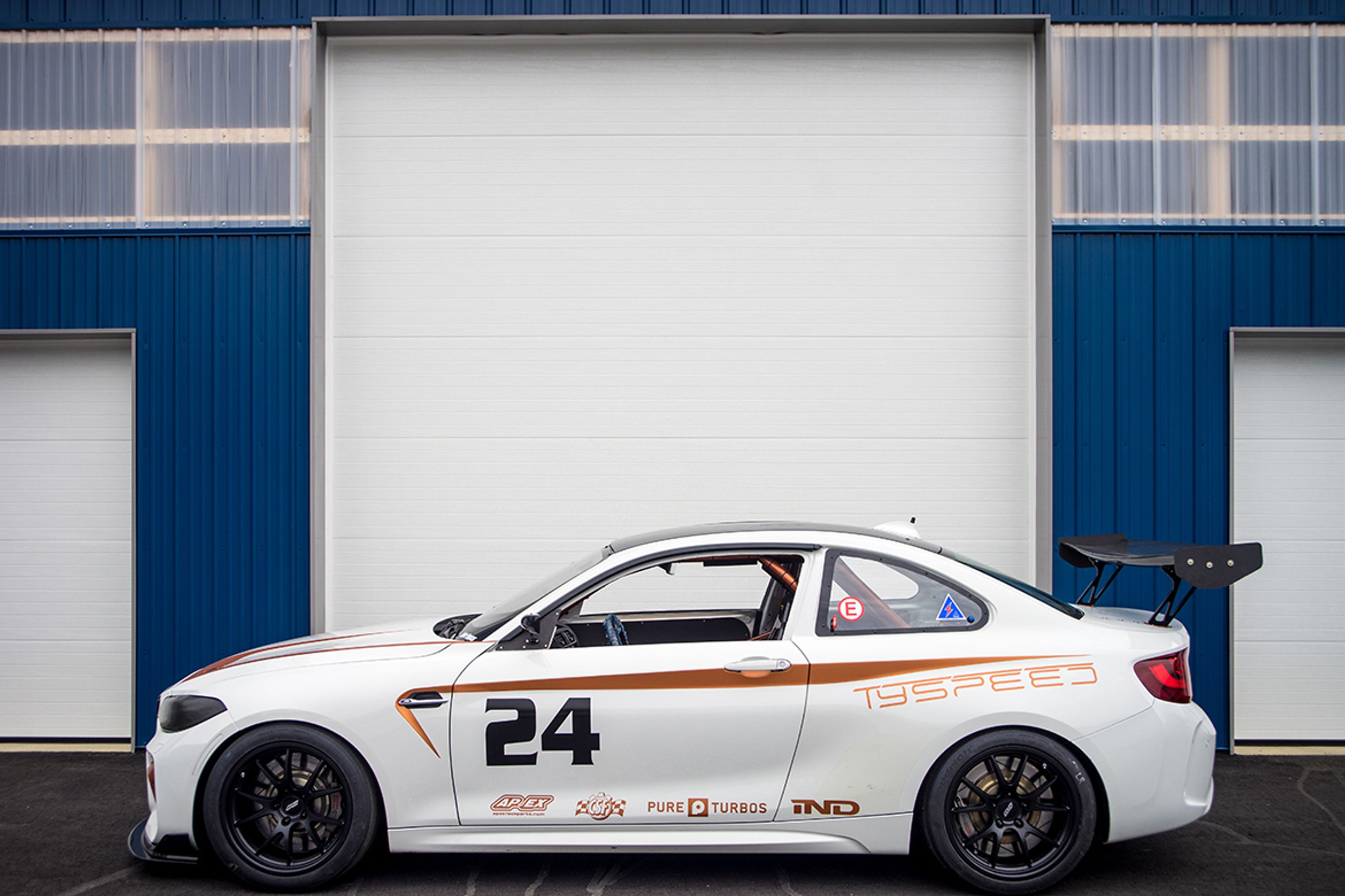 White BMW F87 M2 with 18" FL-5 Apex wheels in Satin Black