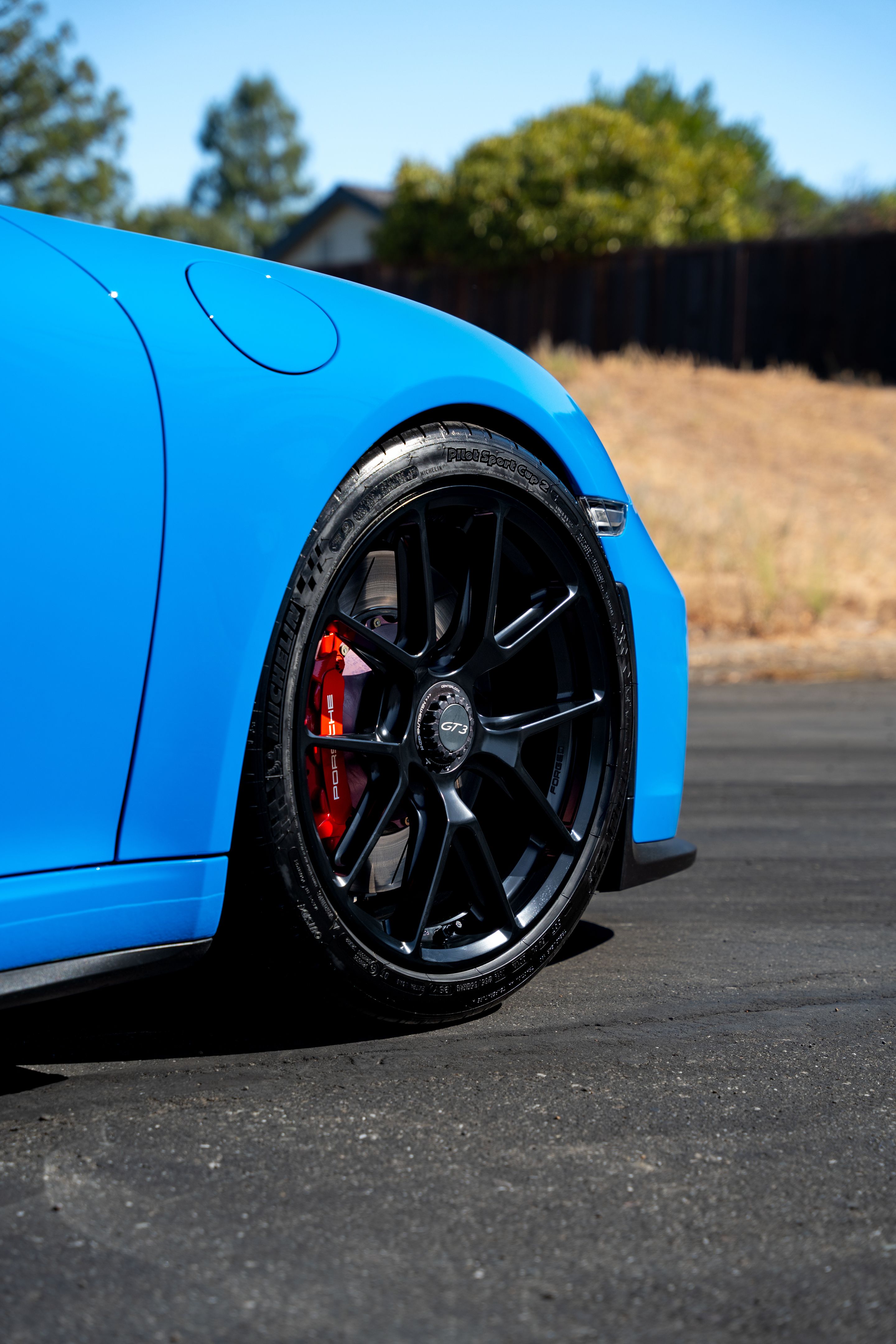 Blue Porsche 911 991.2 GT3 with 19" VS-5RE Apex wheels in Satin Black
