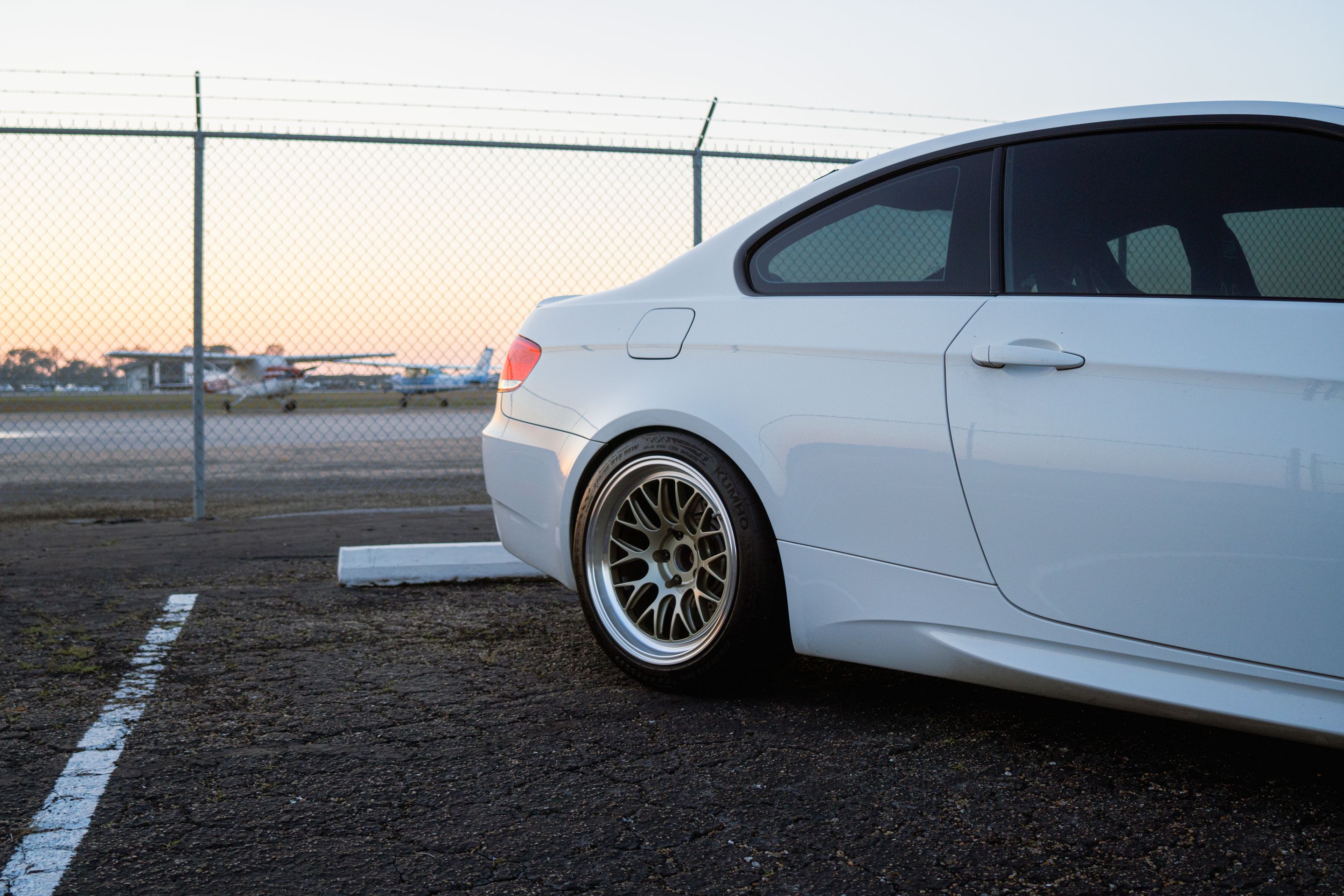 White BMW E92 Coupe M3 with 18" ML-10RT Apex wheels in Machined Lip Gloss Motorsport Gold