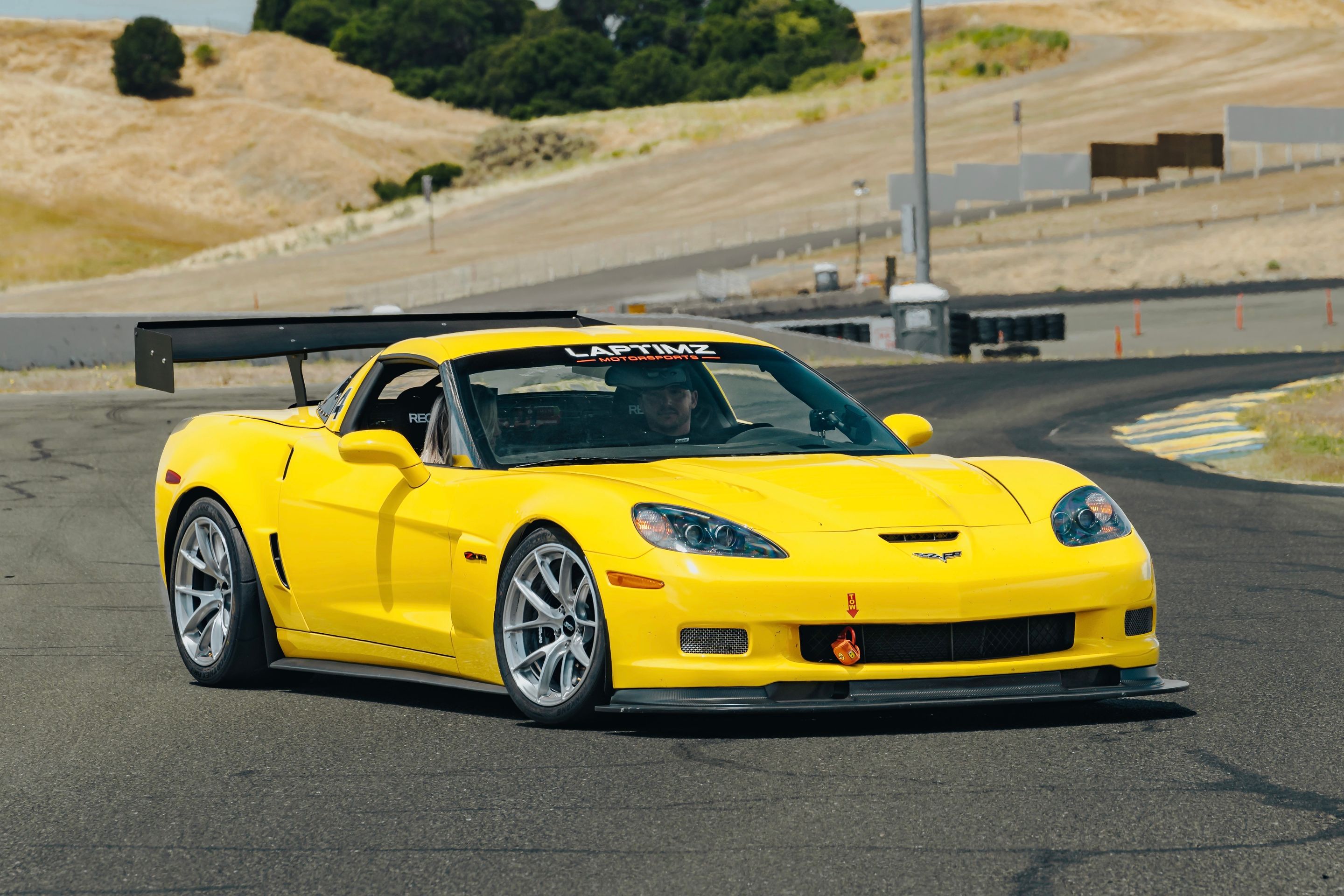 Yellow Chevrolet C6 Corvette Z06 with 18" VS-5RS Apex wheels in Brushed Clear