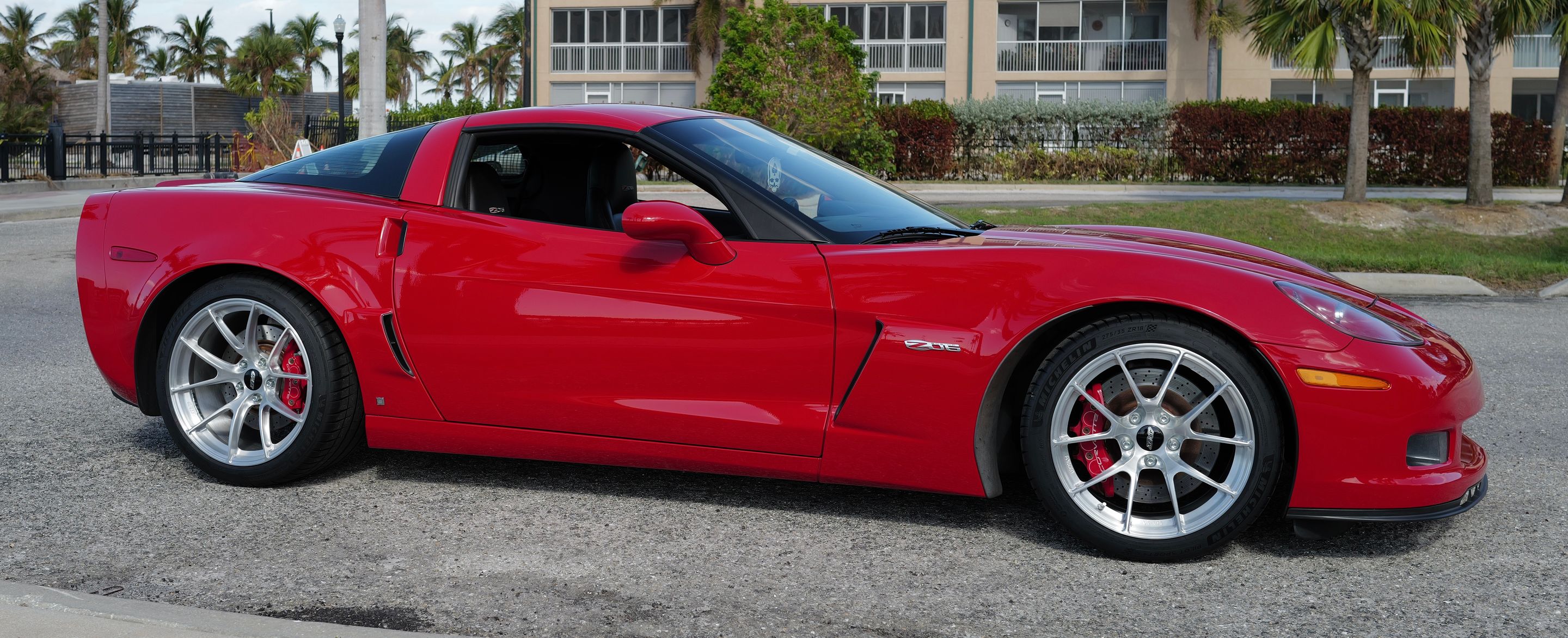 Red Chevrolet C6 Corvette Z06 with 18"/19" VS-5RS Apex wheels in Brushed Clear