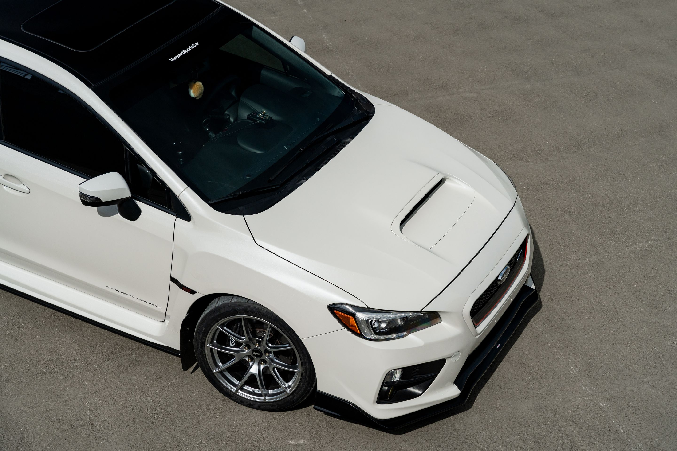White Subaru VA WRX STI with 18" VS-5 Apex wheels in Hyper Black