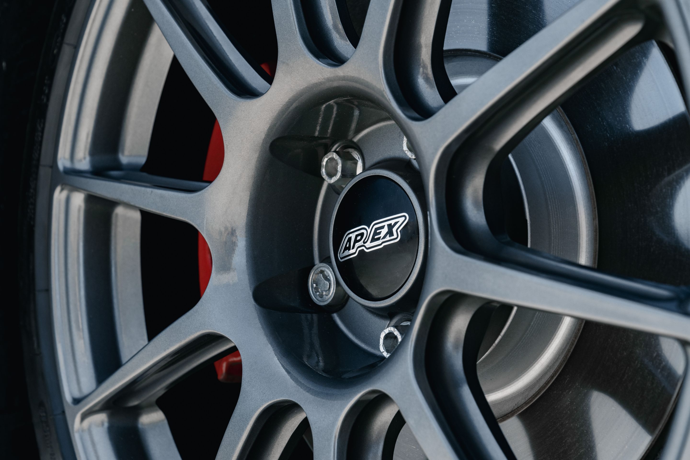 Blue VW MK8 GTI with 18" SM-10 Apex wheels in Anthracite