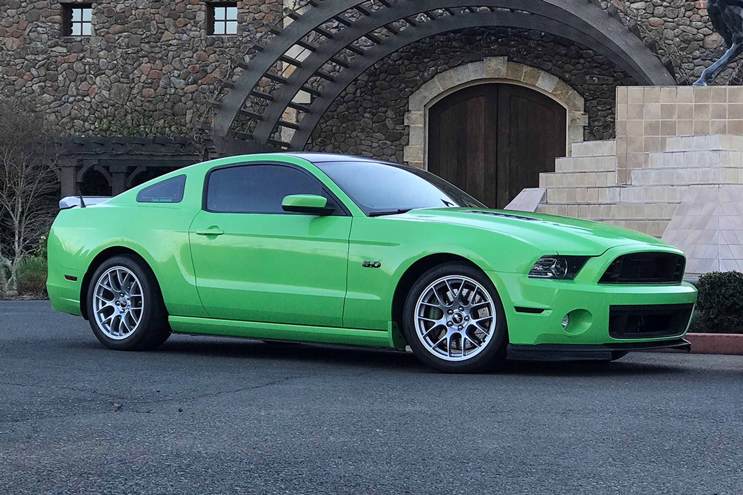 Green Ford S197 Mustang GT with 18" EC-7 Apex wheels in Race Silver